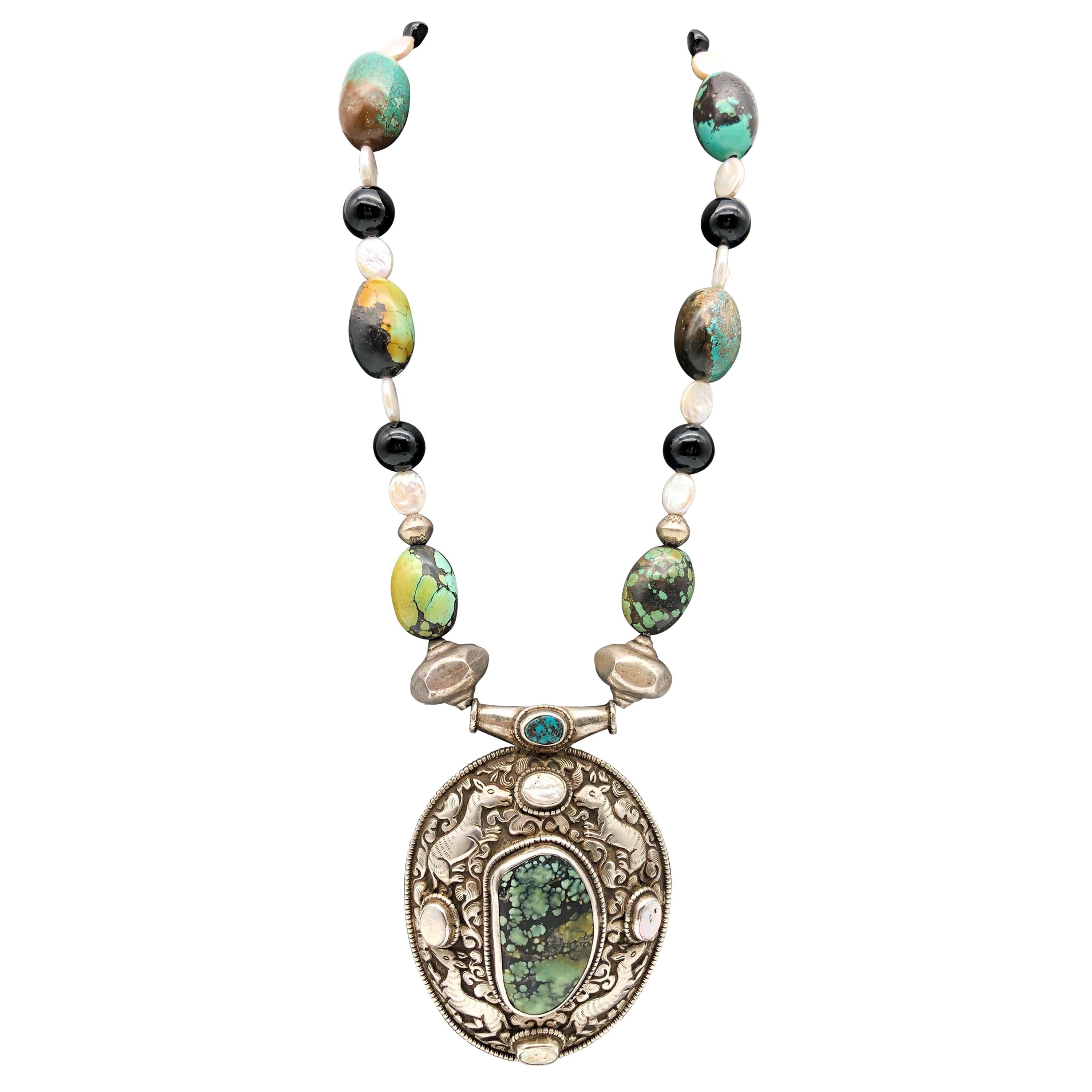 A.Jeschel Marvelous Turquoise necklace with Tibetan Pendant For Sale