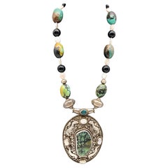 A.Jeschel, collier fantastique en turquoise avec pendentif tibétain