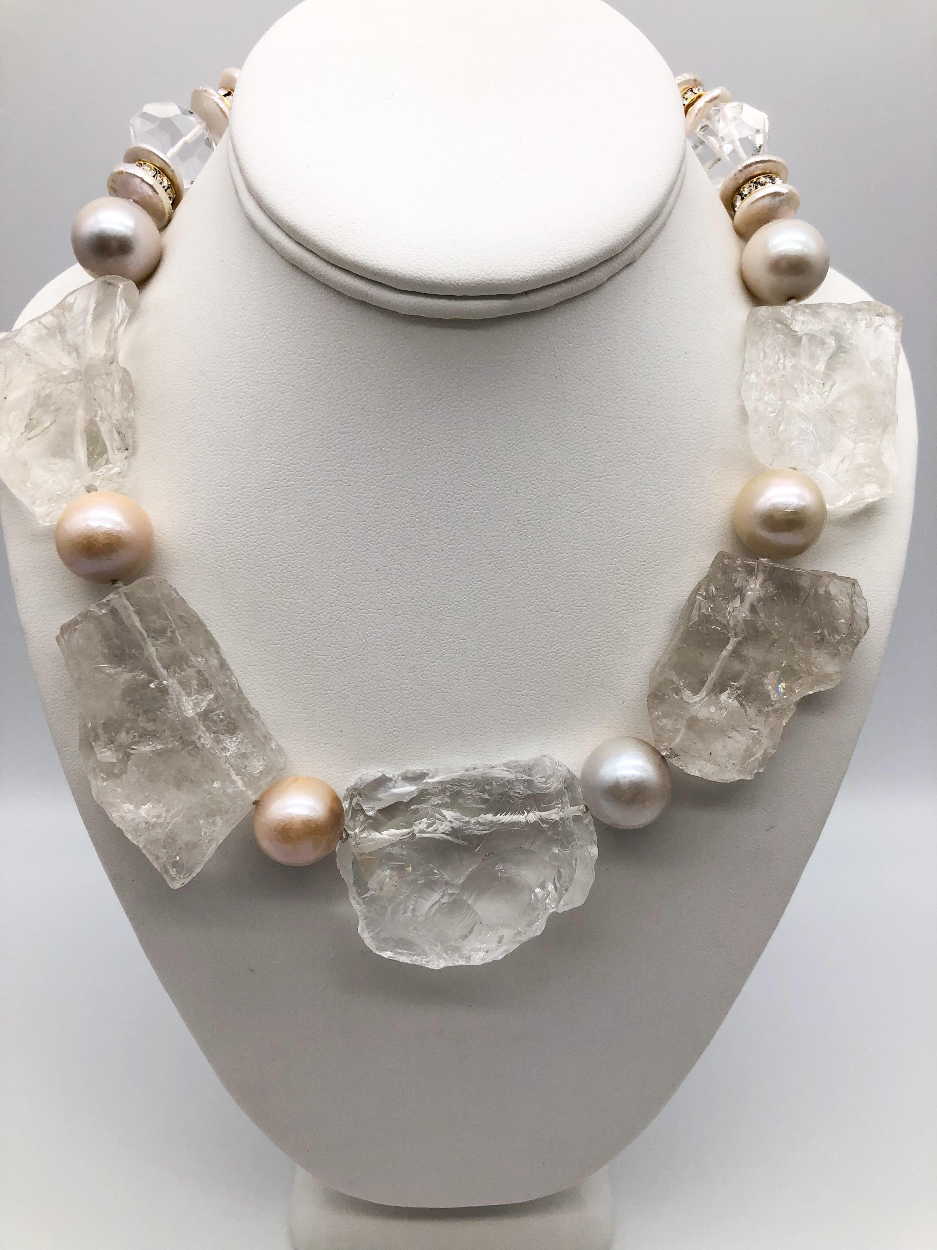 One-of-a-Kind

Massive rich hammered Rock crystal p separated by lustrous 18mm Freshwater Pearls make a brilliant statement. The clasp is Drusy set in Vermeil. The entire necklace is just a “look- me-pieces