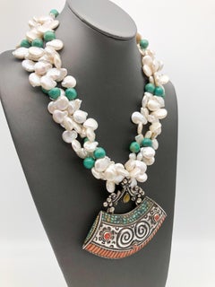 A.Jeschel Multi strand Freshwater Pearl with Tibetan pendant