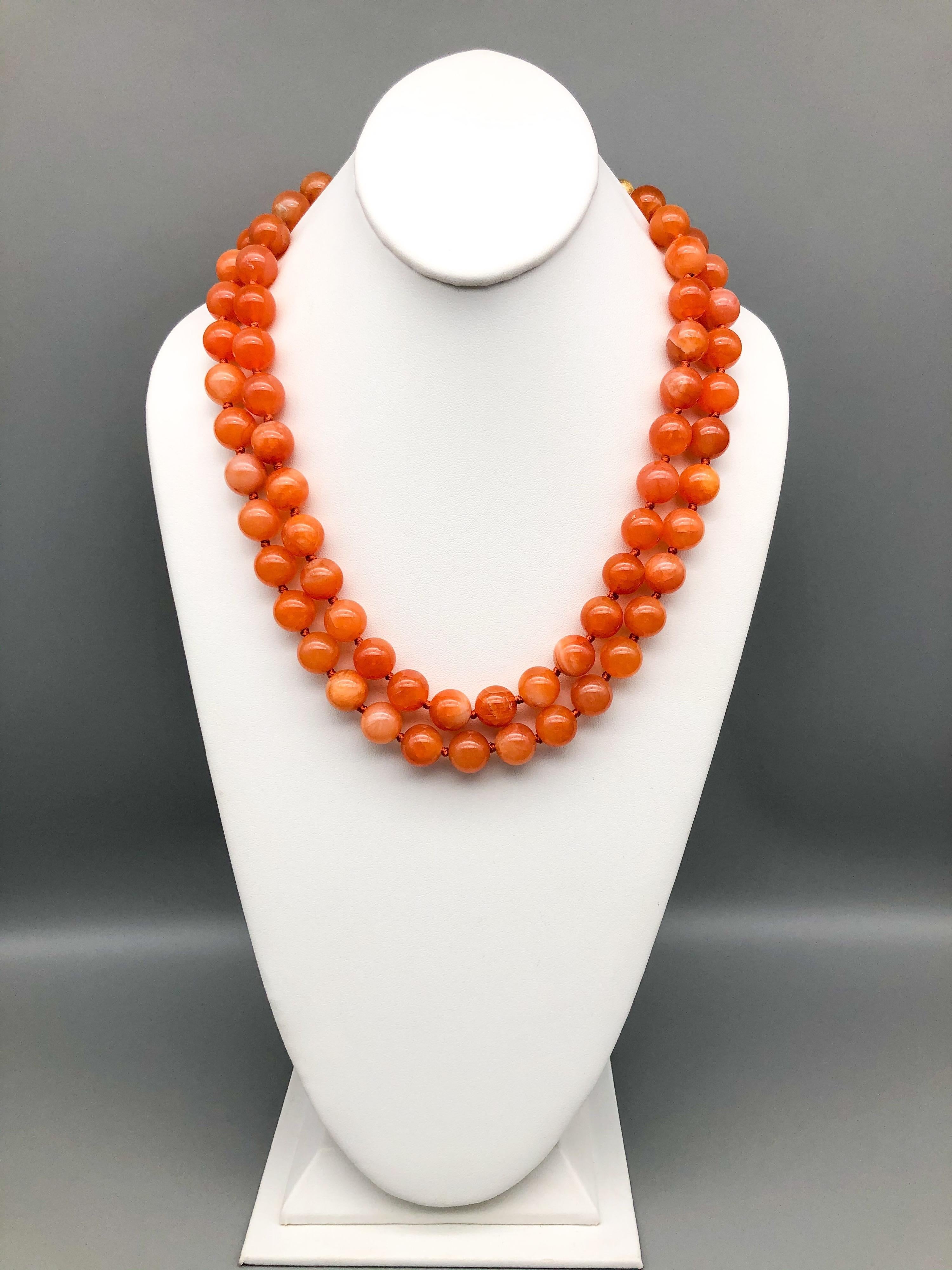Bead A.Jeschel Natural orange Chalcedony, soft and flattering.