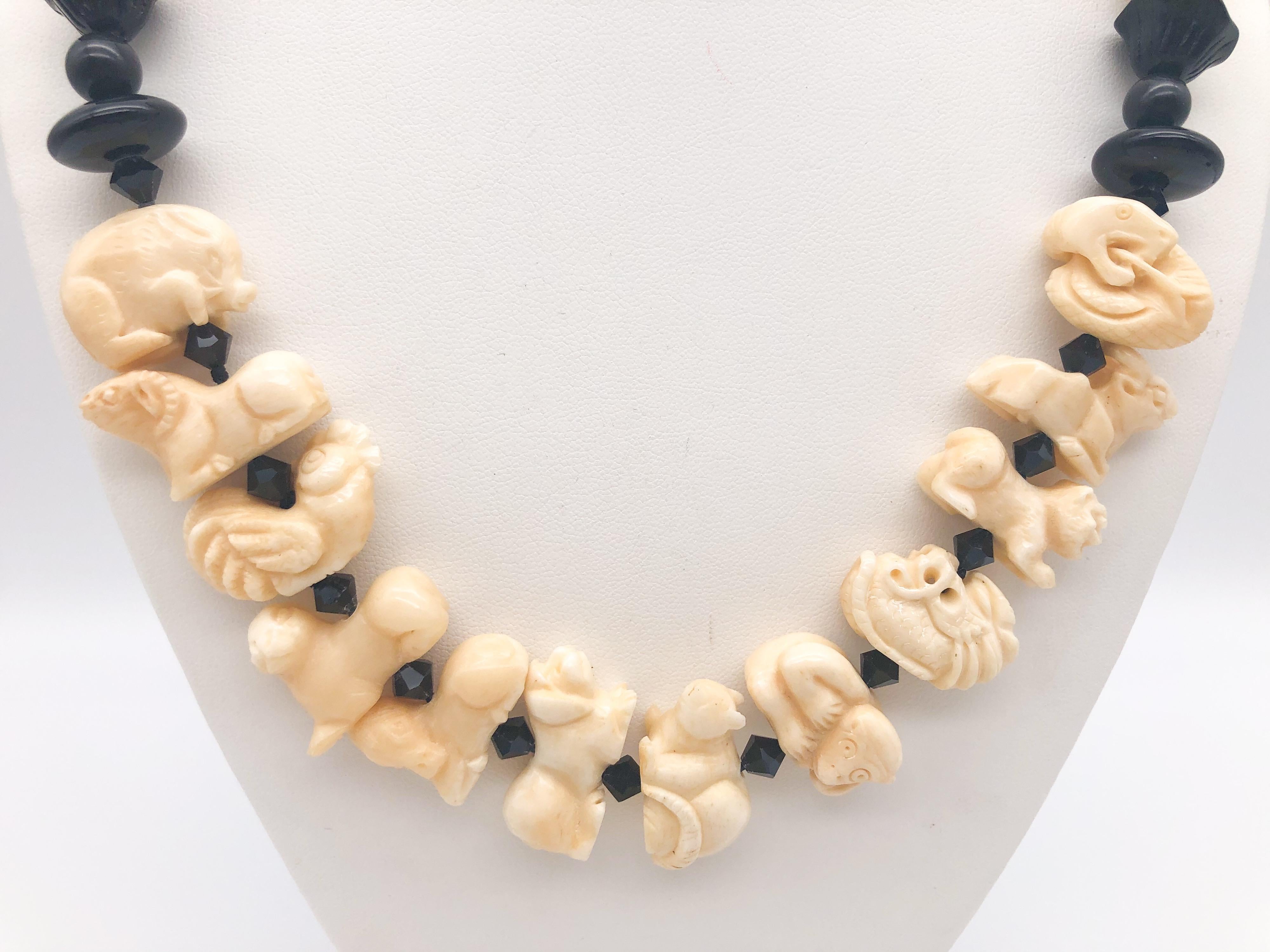 Contemporary A.Jeschel Onyx and Carved Bone Chinese zodiac necklace