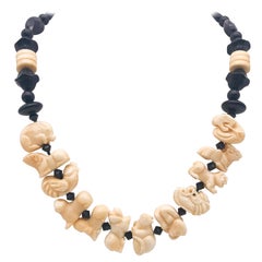 A.Jeschel Onyx and Carved Bone Chinese zodiac necklace