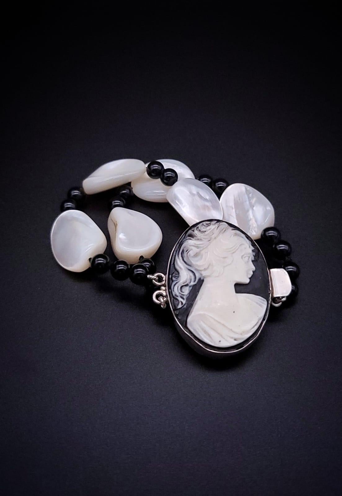 Mixed Cut A.Jeschel Statement onyx bracelet with a carved Cameo clasp . For Sale