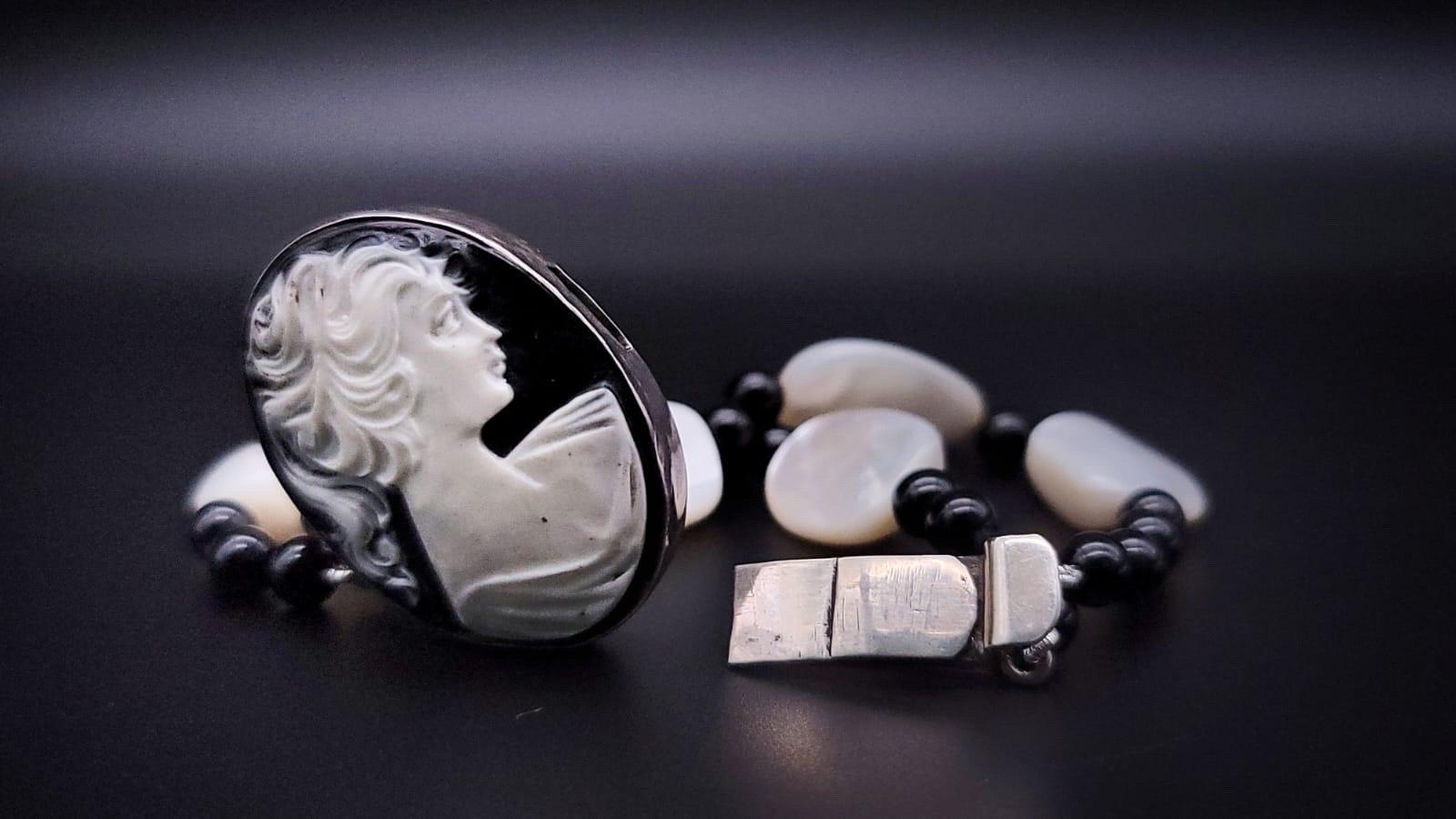 Women's or Men's A.Jeschel Statement onyx bracelet with a carved Cameo clasp . For Sale