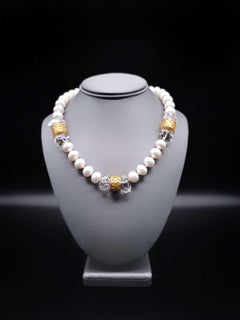A.Jeschel, collier élégant à un seul brin en perles et cristal.