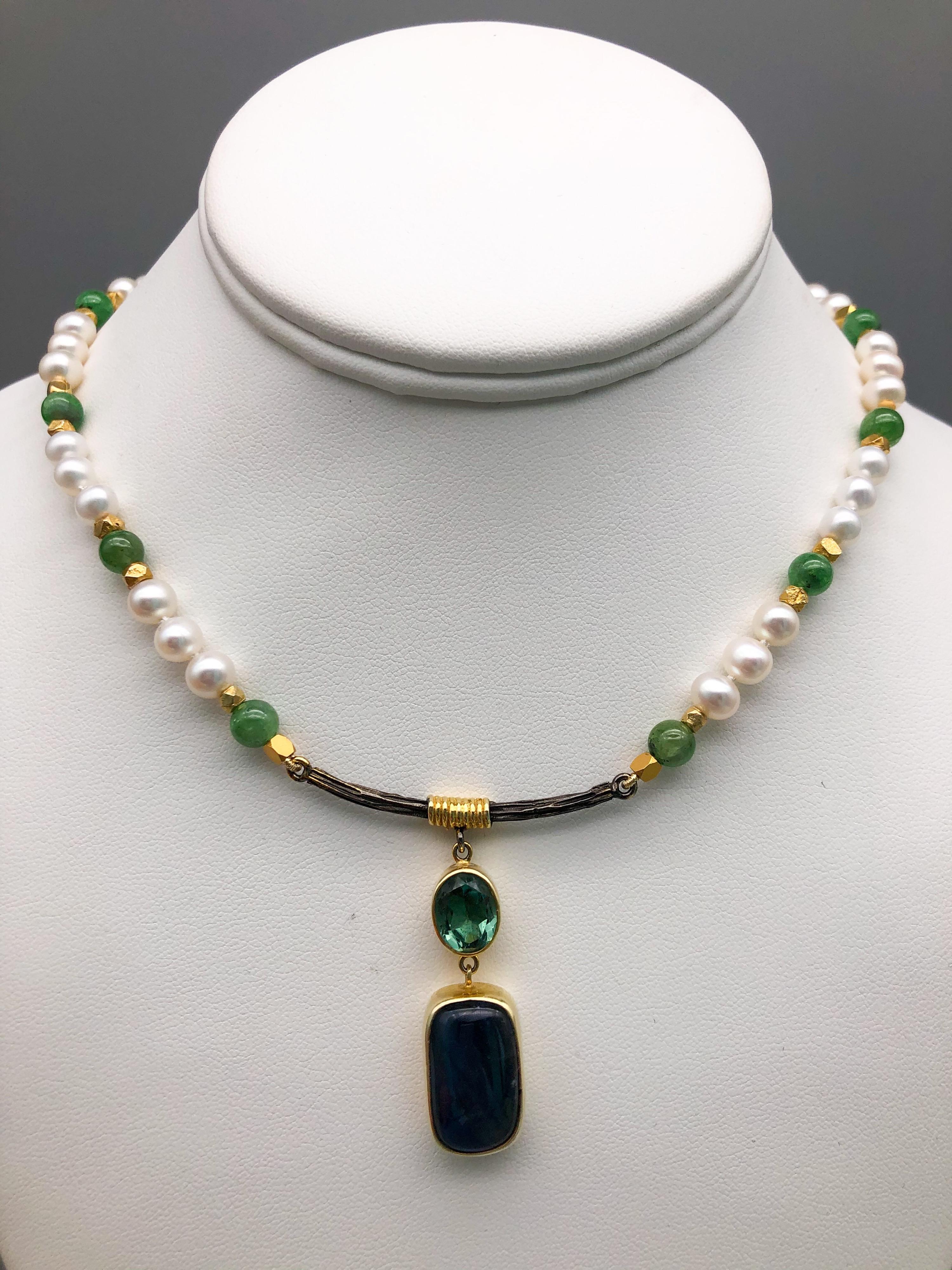 One-of-a-Kind
Just when you are looking for something that is a fresh take on a single strand necklace we teams up with a “Bora “design to bring you a really flattering necklace. Strand is Pearl and Emerald beads surrounding a pendant of Labradorite