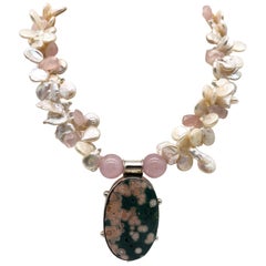 A.Jeschel Pink Ocean Jasper pendant suspended from a pearl and Rose Quartz 