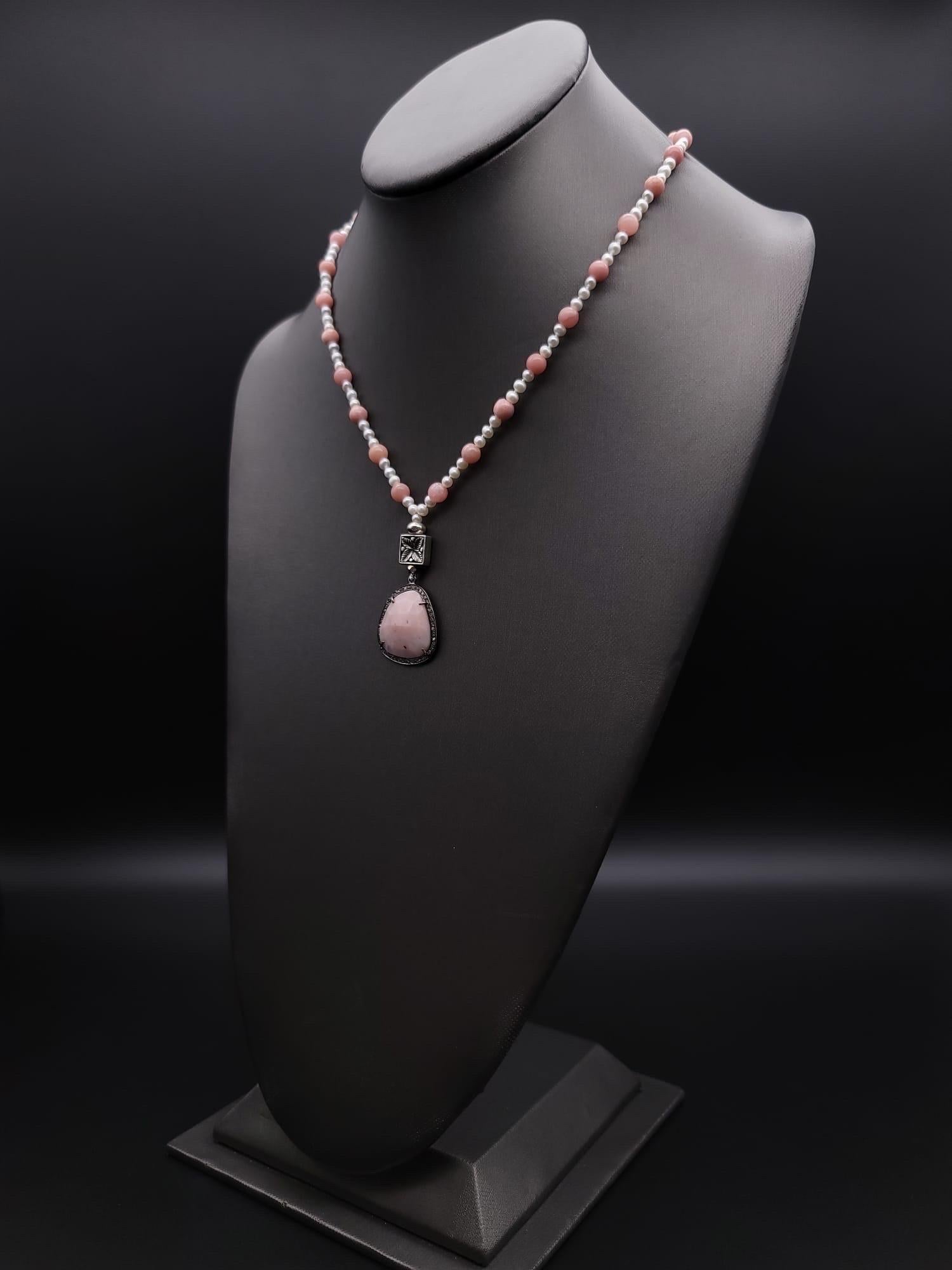 Women's or Men's A.Jeschel Delicate Freswater Pearl and Pink opal Pendant necklace. For Sale