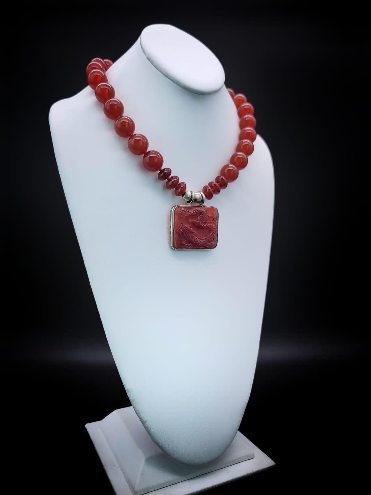 Contemporary A.Jeschel Powerful Carnelian necklace with a Dragon pendant. For Sale