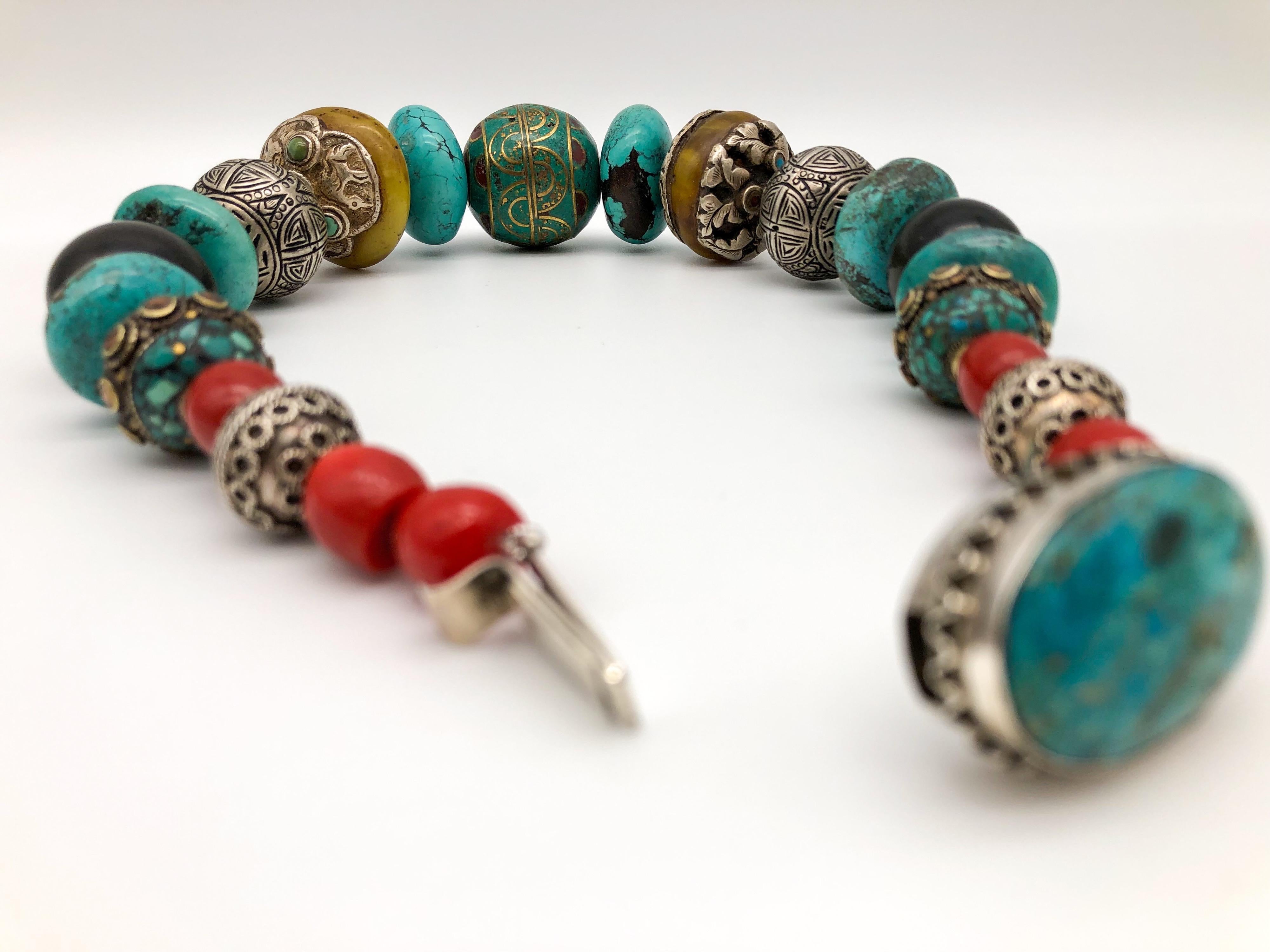 A.Jeschel Powerful Turquoise necklace with a large center bead of Tibetan.  1