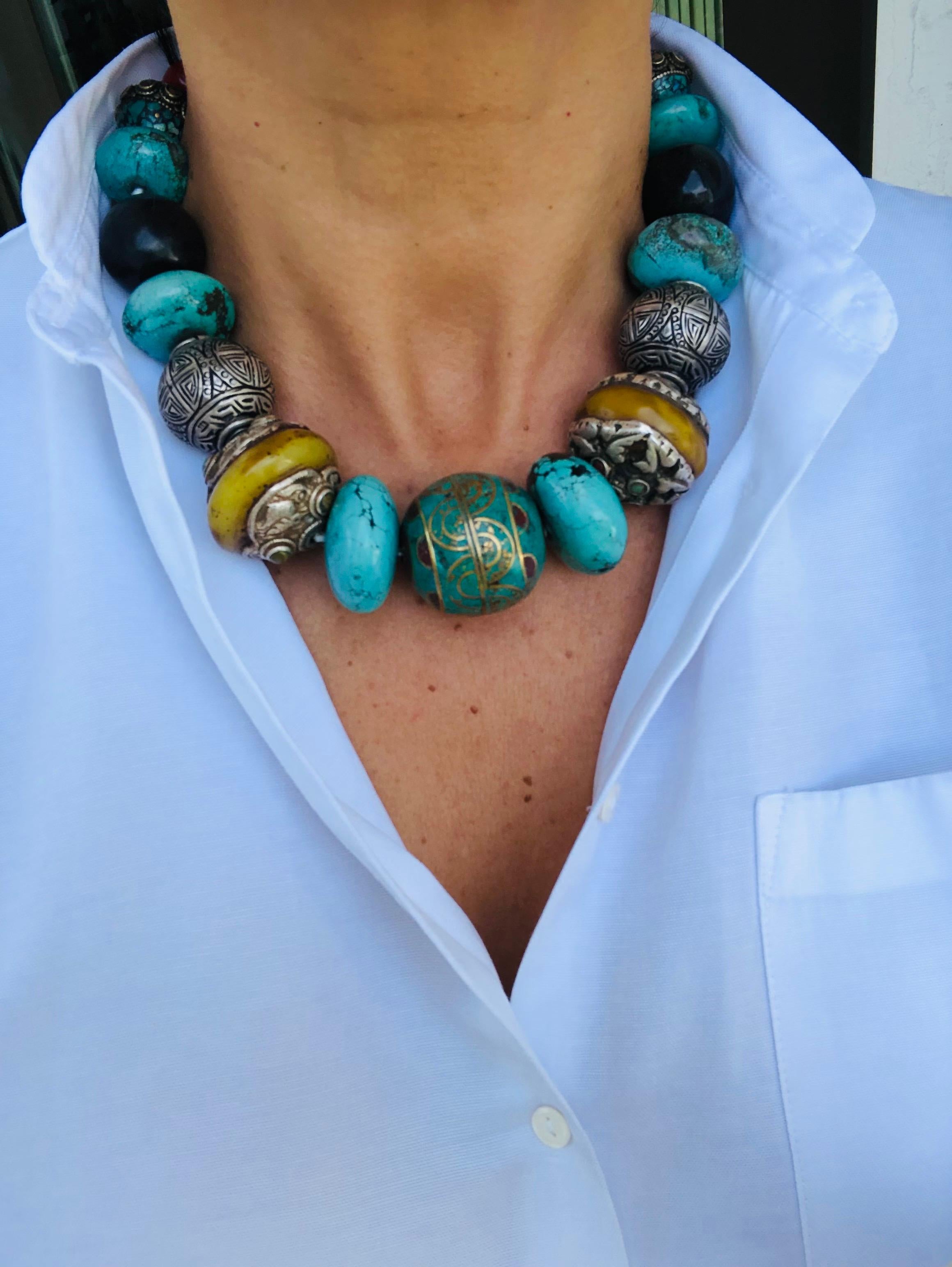 A.Jeschel Powerful Turquoise necklace with a large center bead of Tibetan.  2