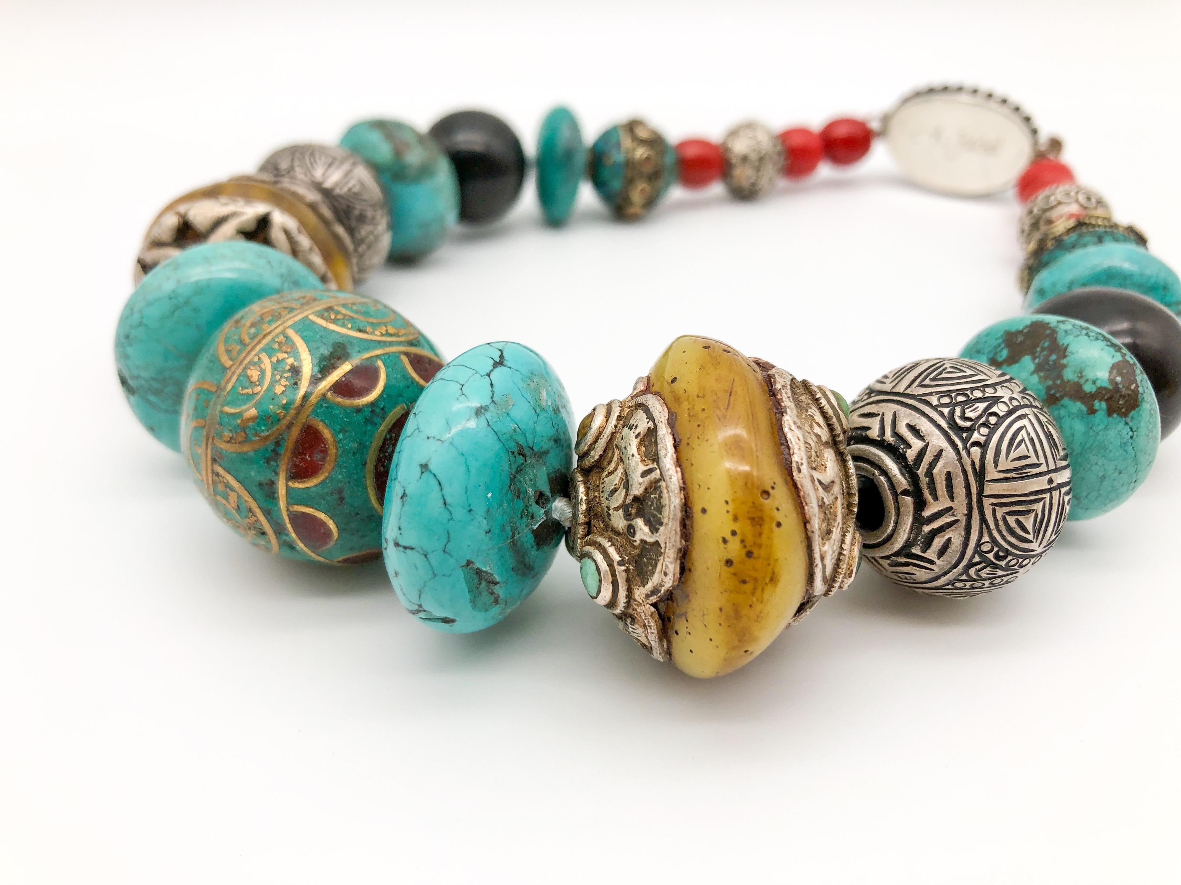 Contemporary A.Jeschel Powerful Turquoise necklace with a large center bead of Tibetan. 