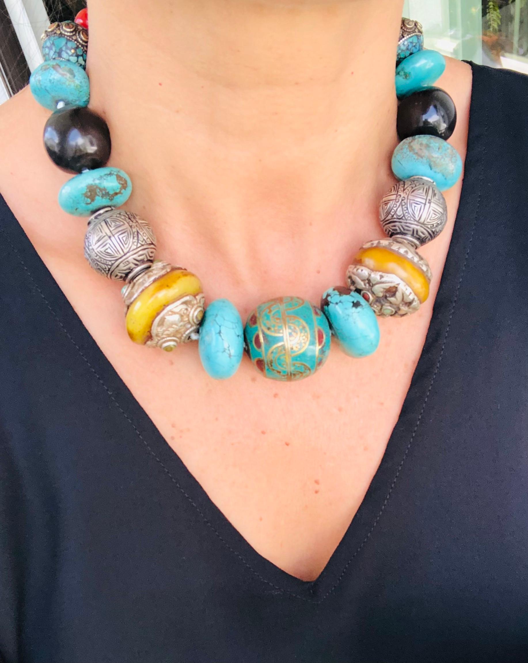 Mixed Cut A.Jeschel Powerful Turquoise necklace with a large center bead of Tibetan. 