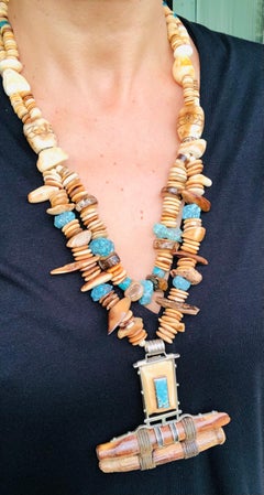 A.Jeschel Remarkable prehistoric Turquoise and Fossil Pendant necklace.