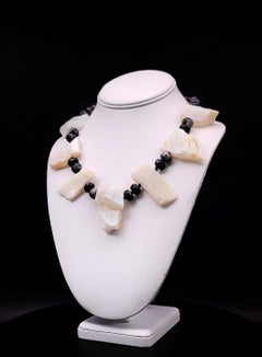 A.Jeschel Rough White Opal bold necklace with a Vintage cameo.