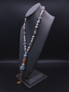 A.Jeschel Softly colored polished Aquamarine long necklace.