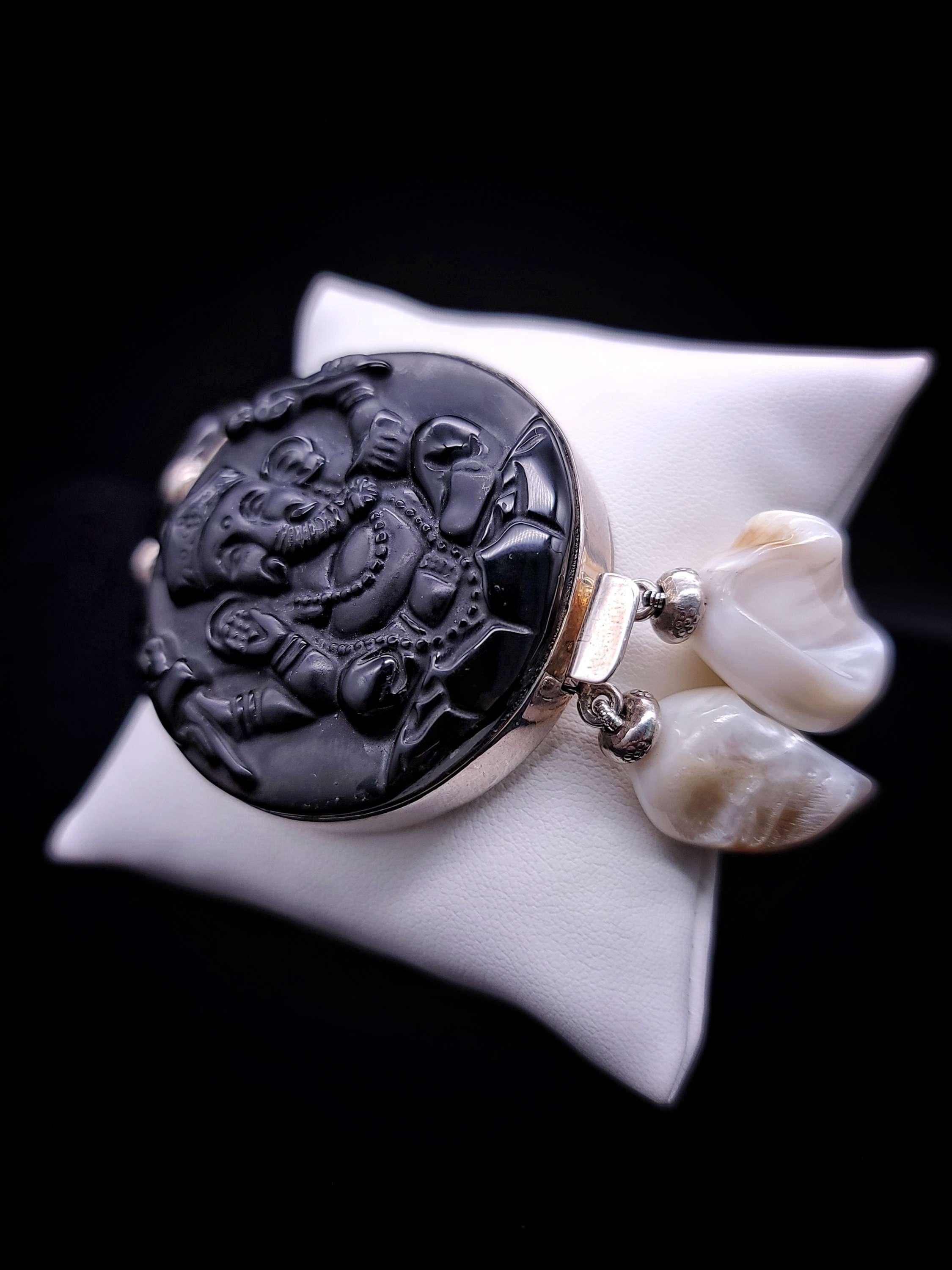 Mixed Cut A.Jeschel Statement bold Onyx bracelet with lord Ganesh carved clasp. For Sale