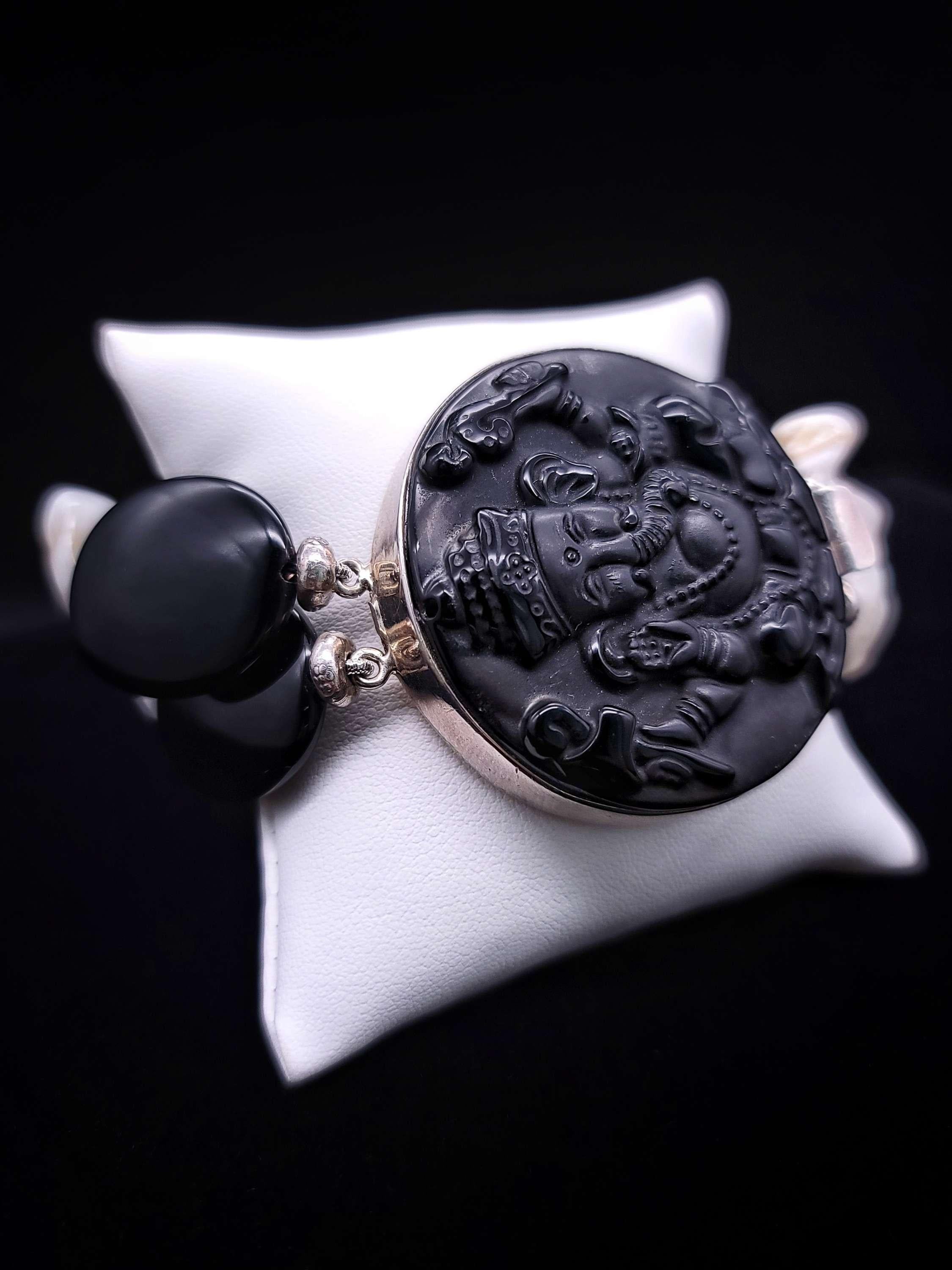 Women's or Men's A.Jeschel Statement bold Onyx bracelet with lord Ganesh carved clasp. For Sale