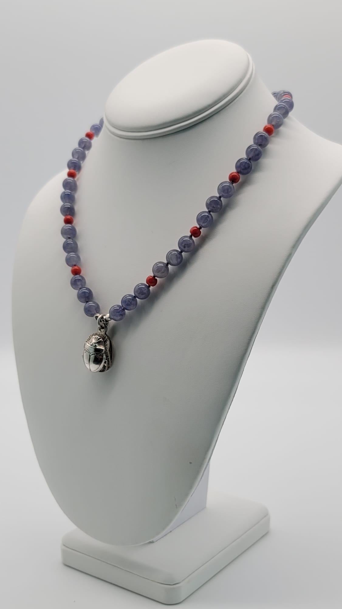 Contemporary A.Jeschel Sterling silver Scarab supended from an Iolite and coral necklace For Sale