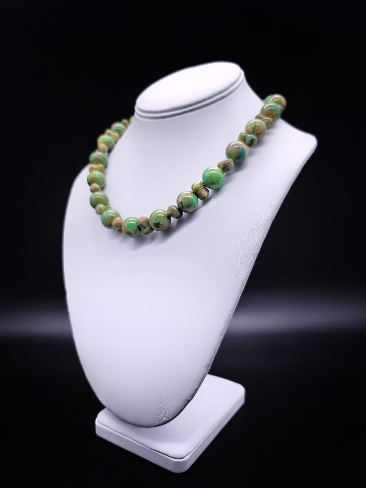 One-of-a-Kind

 Carico Turquoise is a sought-after gemstone known for its striking green coloration. Mined in the Carico Lake region in Nevada it is highly prized for its unique blend of yellow and green tones. The necklace composed of round and