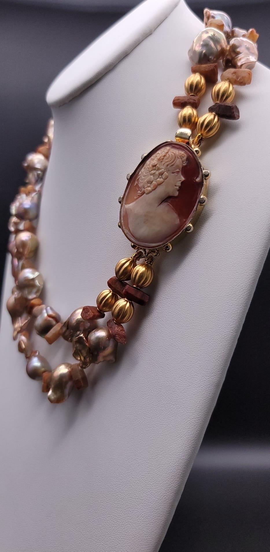 Contemporary A.Jeschel Stunning Gold Baroque Pearl necklace with an Italian cameo side clasp. For Sale