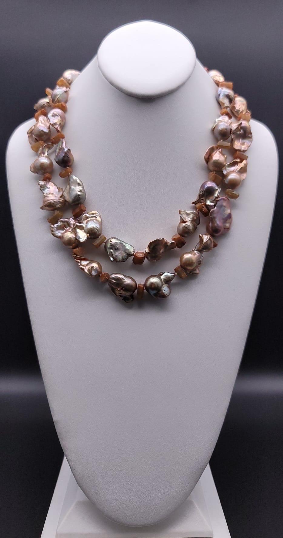 A.Jeschel Stunning Gold Baroque Pearl necklace with an Italian cameo side clasp. In New Condition In Miami, FL