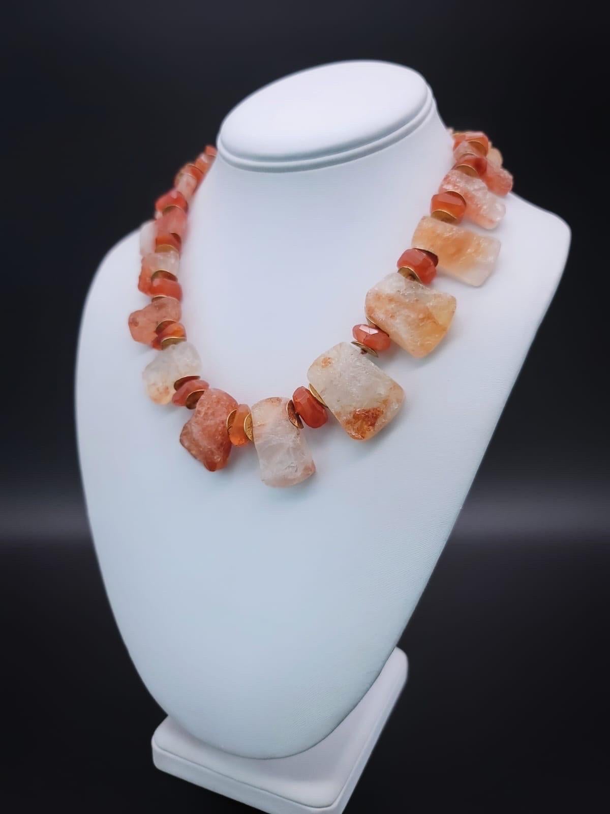One-of-a-Kind

A sunstone crystal and carnelian single strand necklace.
Named for the distinctive colors of the sunset. These beautiful colored stones are left completely natural in various rich colors from ember glow to flame to whisper of smoke.