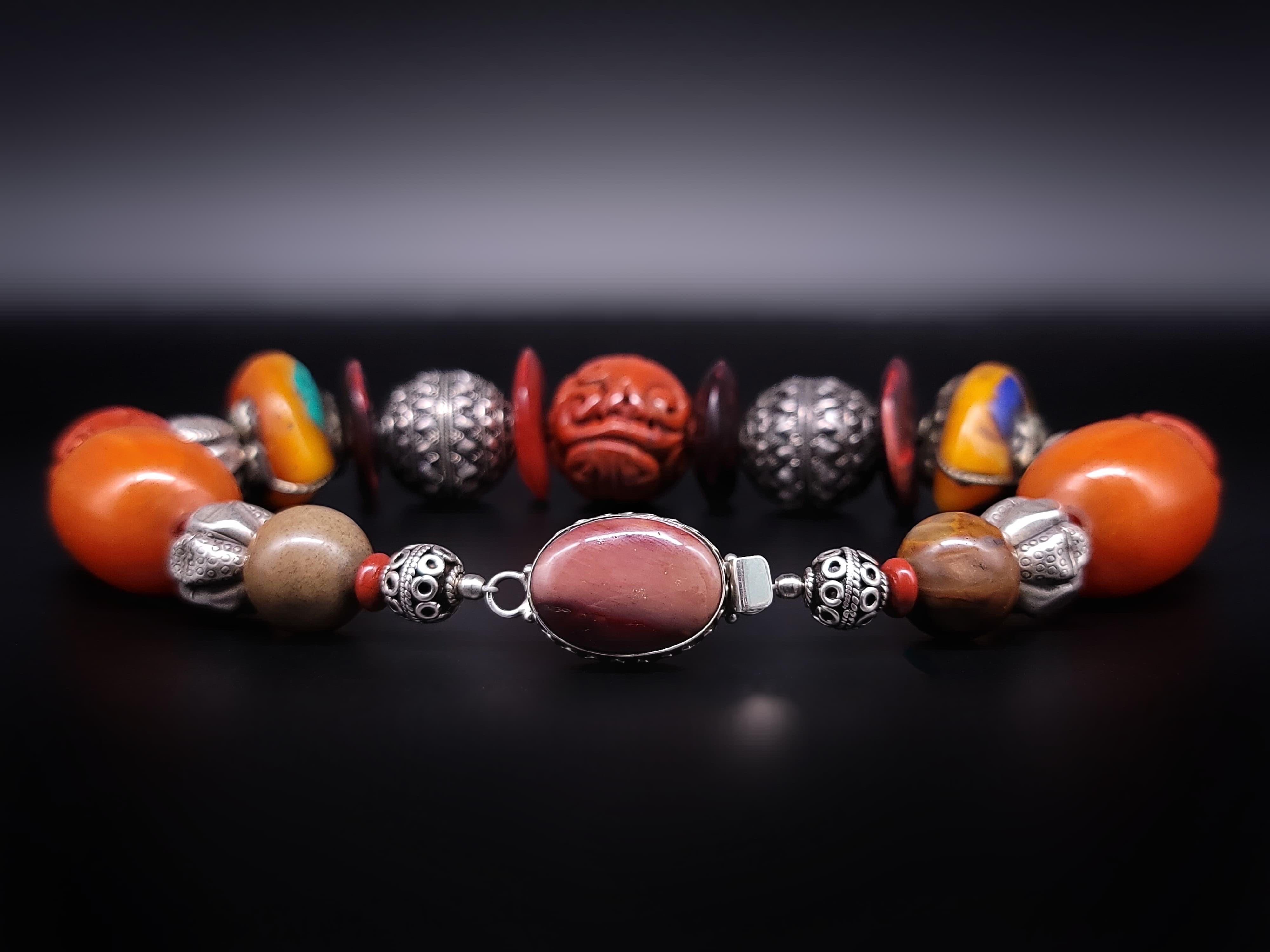 A.Jeschel Tibetan Amber necklace with Carved Ceramic. 11