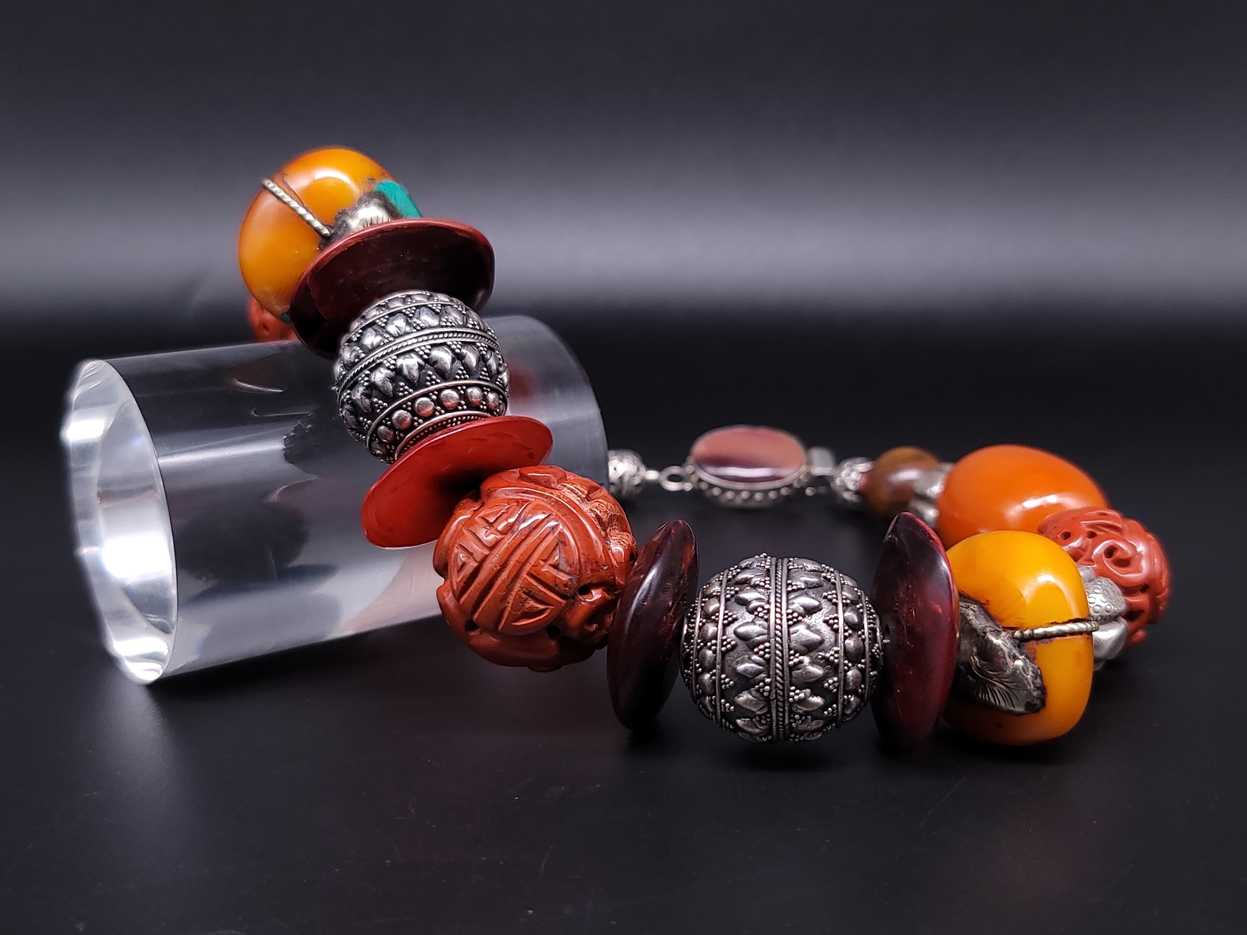 A.Jeschel Tibetan Amber necklace with Carved Ceramic. 13