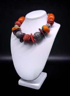 A.Jeschel Tibetan Amber necklace with Carved Ceramic.