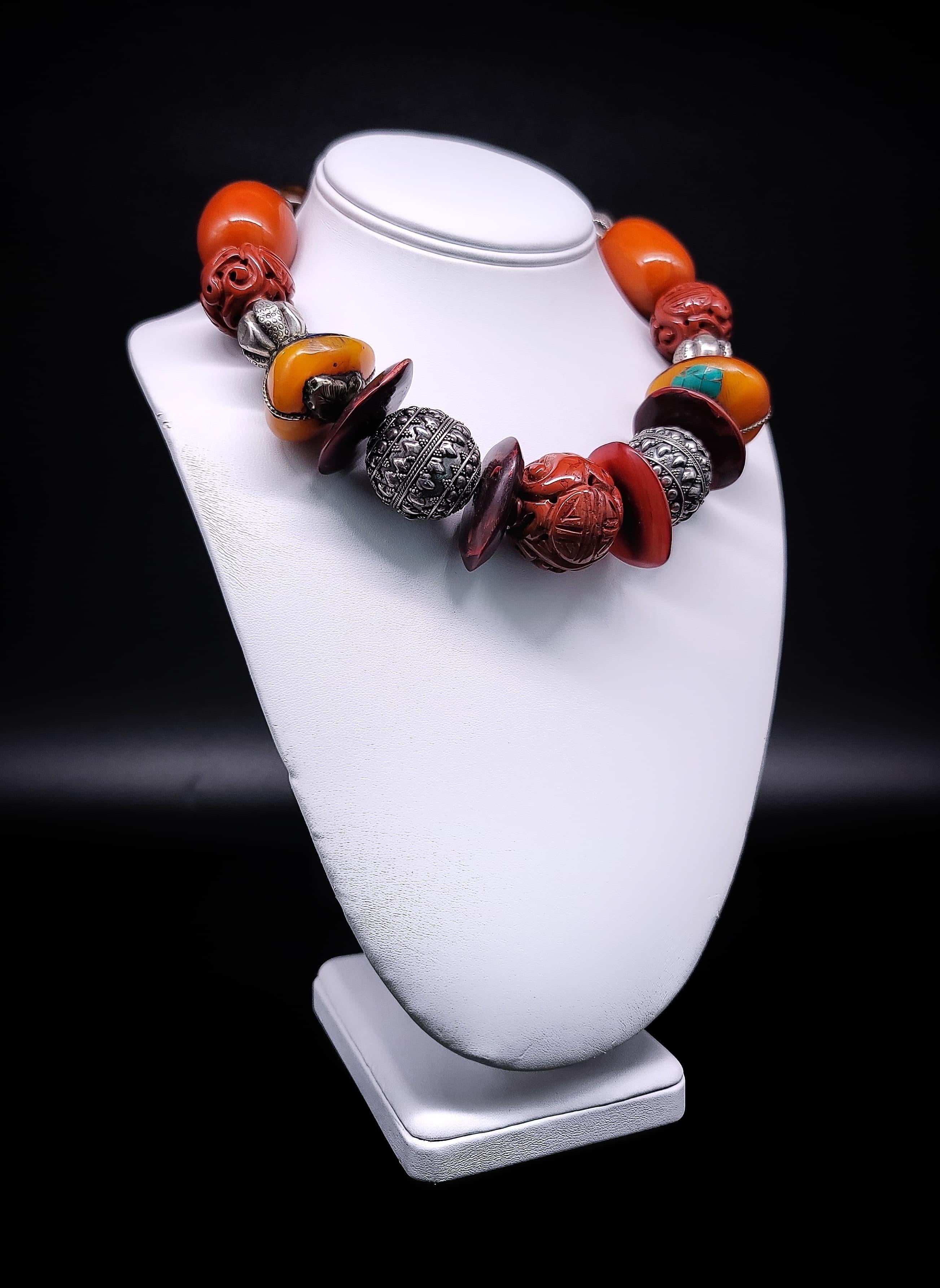 Mixed Cut A.Jeschel Tibetan Amber necklace with Carved Ceramic.