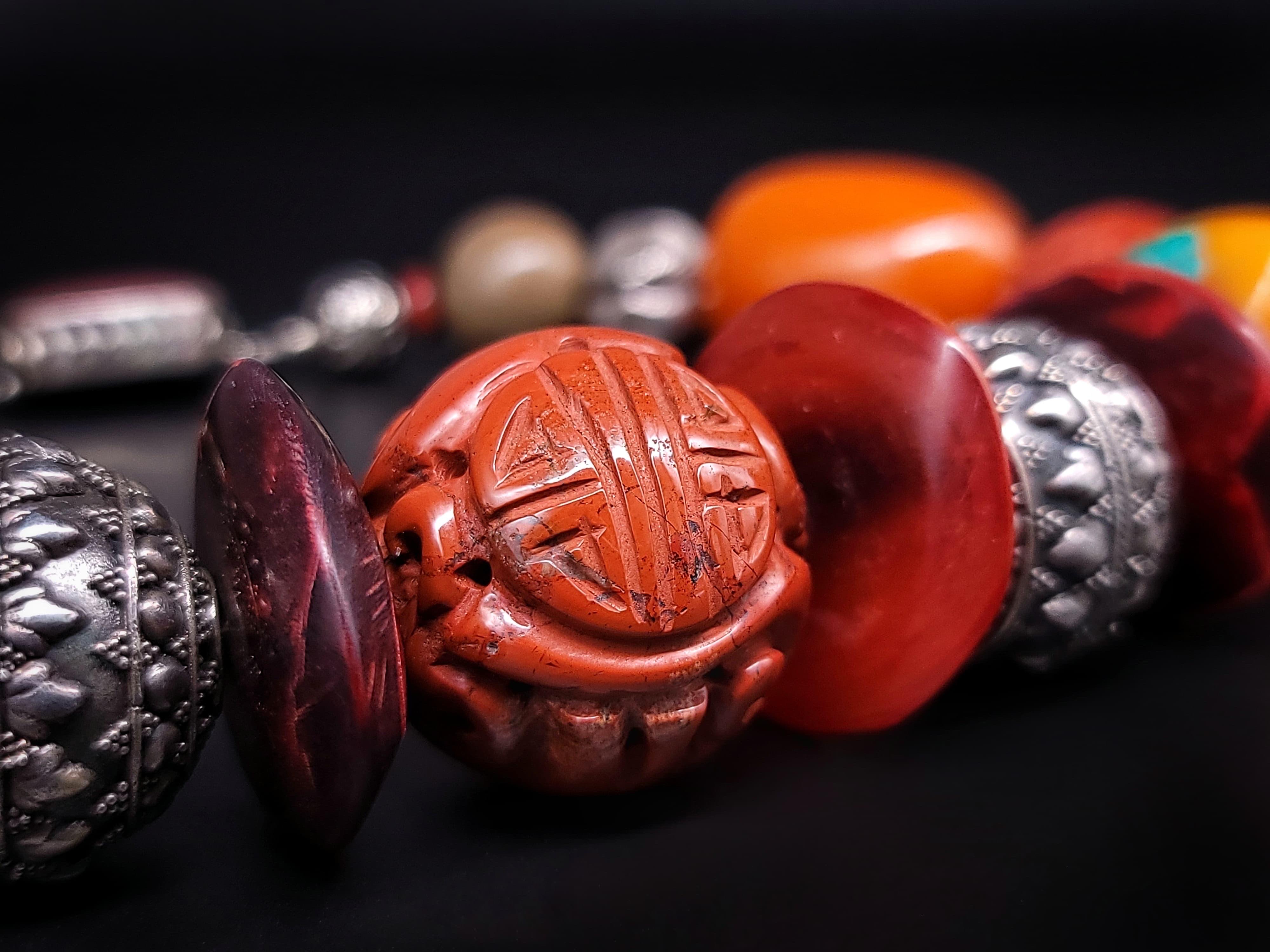 A.Jeschel Tibetan Amber necklace with Carved Ceramic. In New Condition In Miami, FL