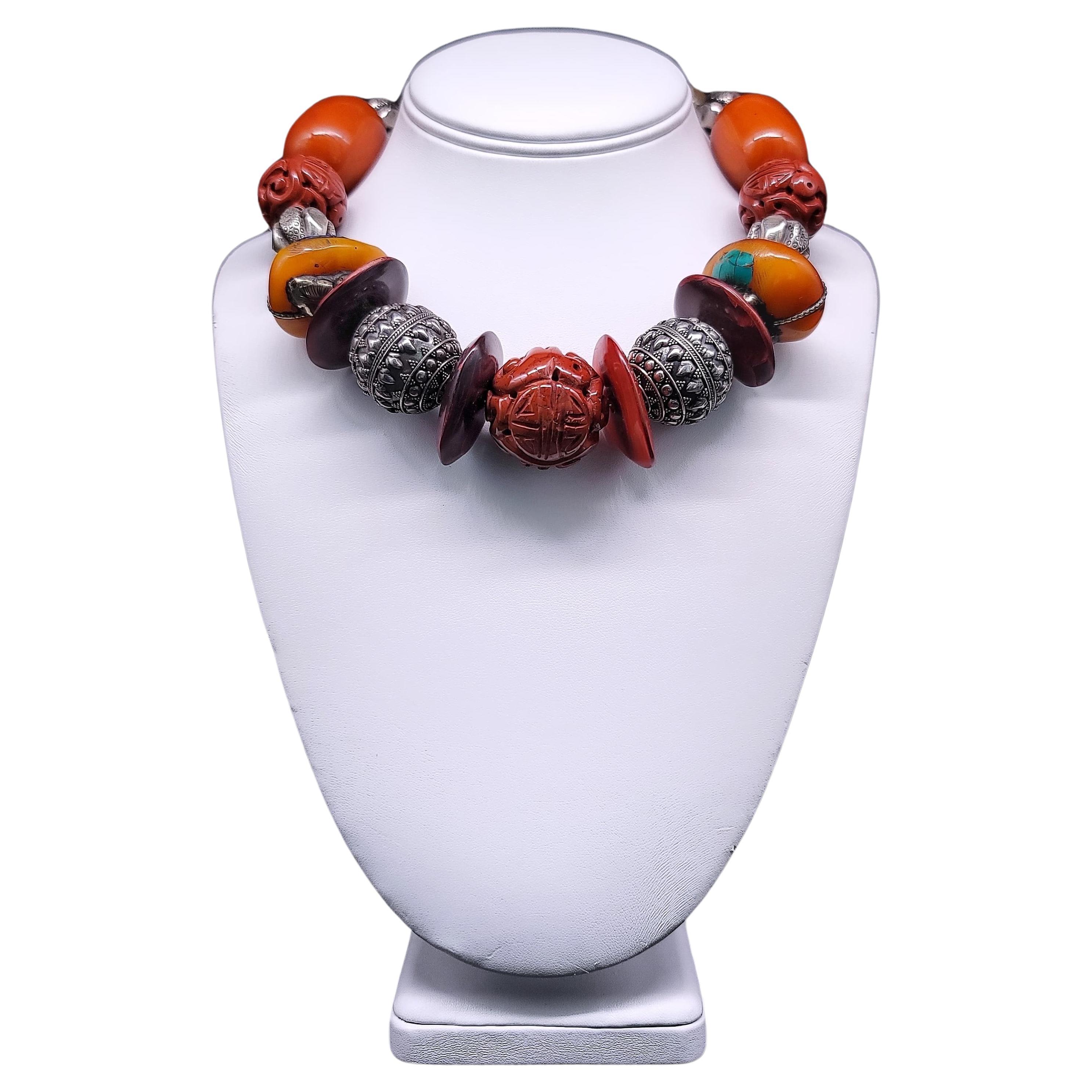 A.Jeschel Tibetan Amber necklace with Carved Ceramic.
