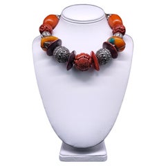 A.Jeschel Tibetan Amber necklace with Carved Ceramic.