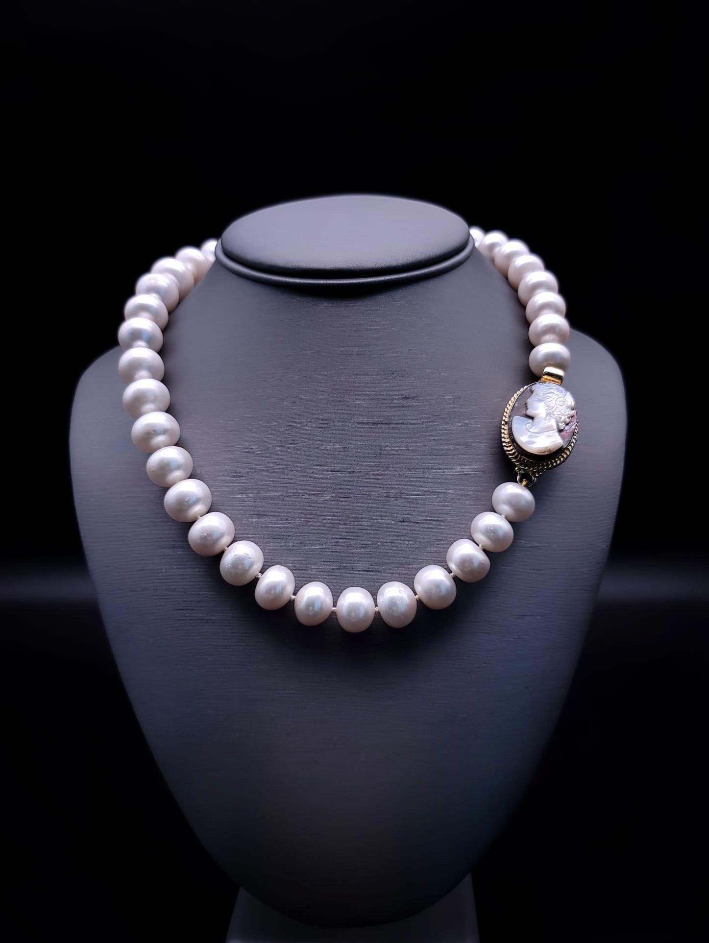 Contemporary A.Jeschel Timeless and elegant Freshwater Pearl and vintage Cameo necklace.