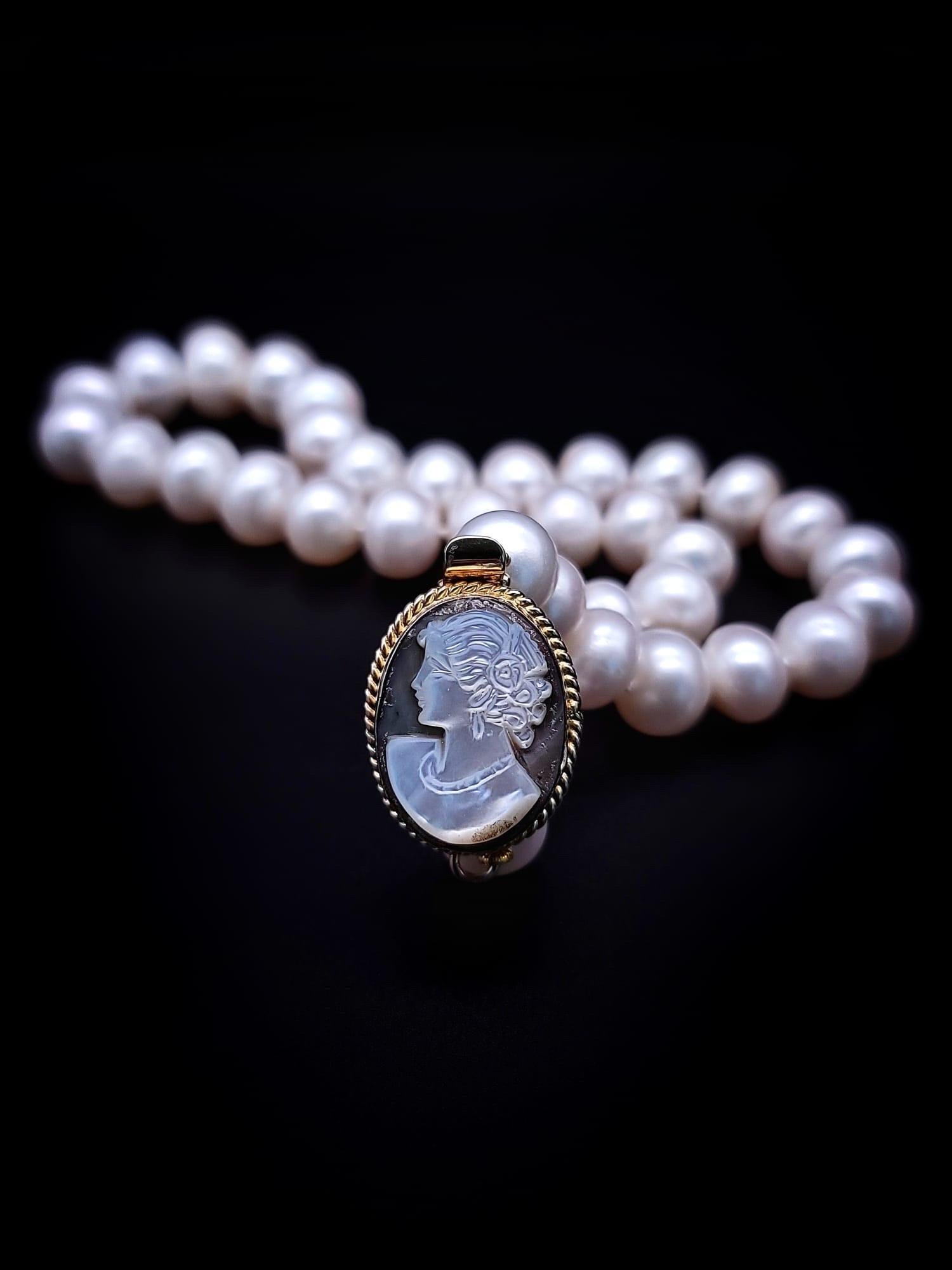 A.Jeschel Timeless and elegant Freshwater Pearl and vintage Cameo necklace. 1