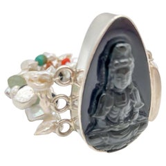 A.Jeschel Triplo filo di perle e bracciale Buddha.