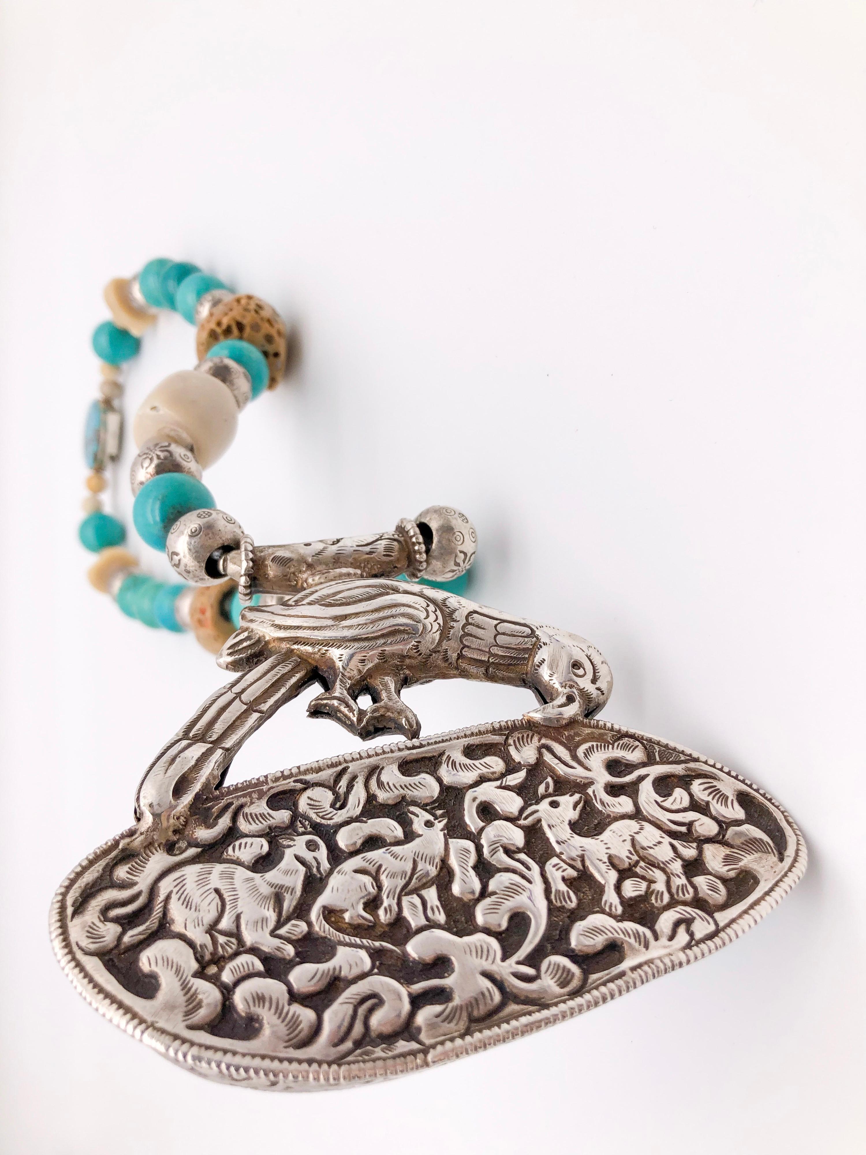 A.Jeschel Turquoise and Ethnic beads necklace with Tibetan Silver Bird Pendant   For Sale 6