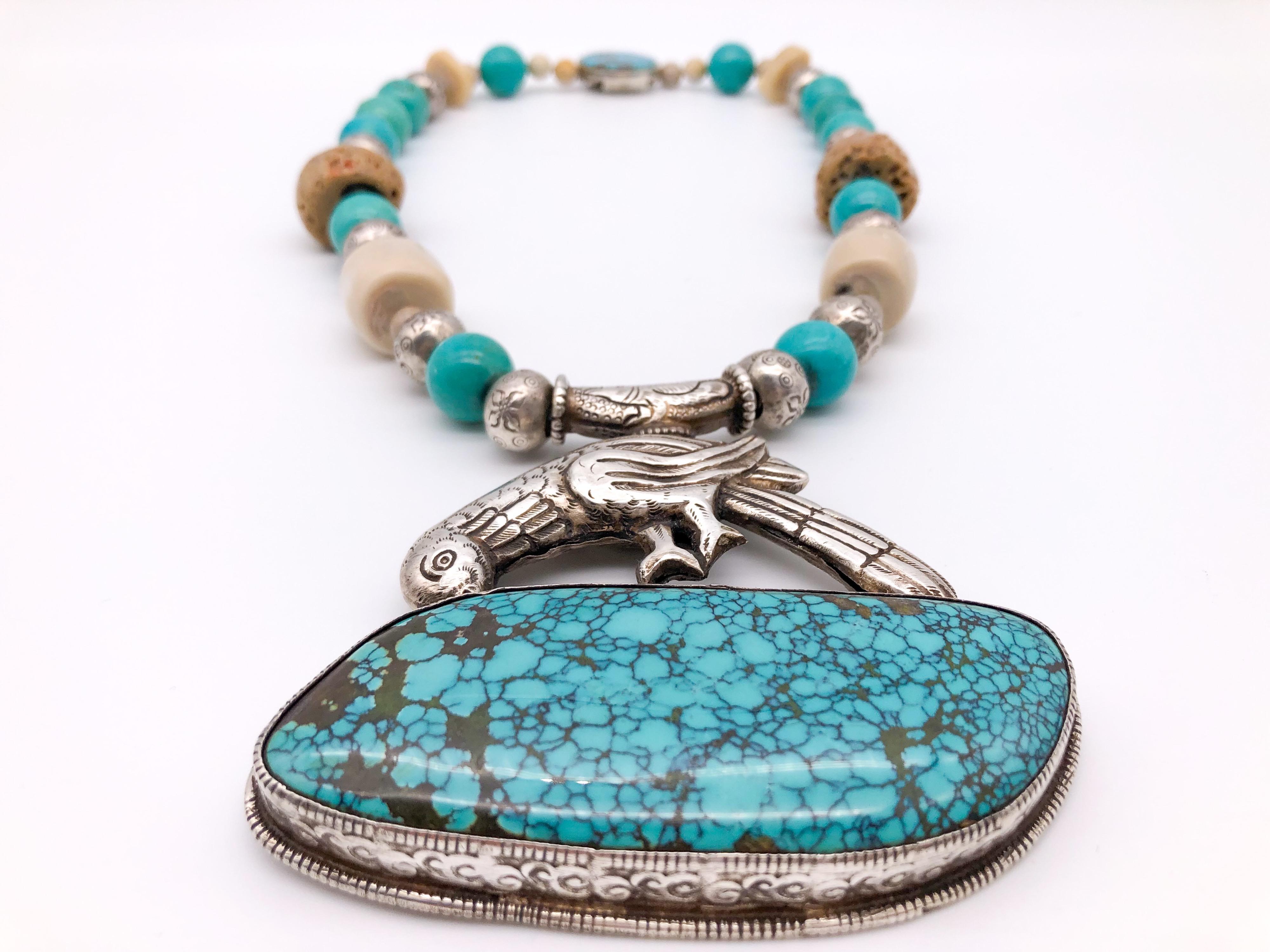Contemporary A.Jeschel Turquoise and Ethnic beads necklace with Tibetan Silver Bird Pendant   For Sale