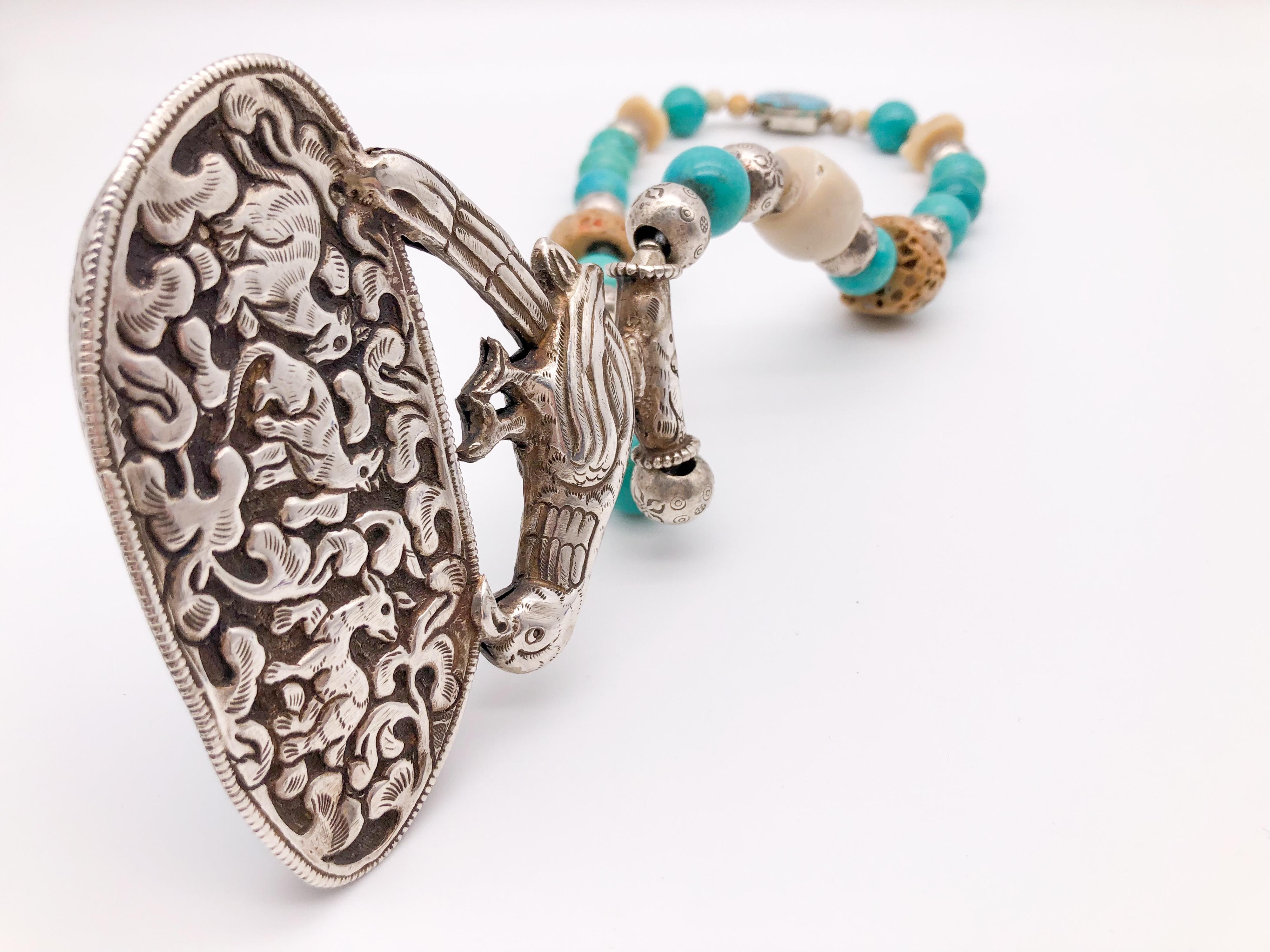 Mixed Cut A.Jeschel Turquoise and Ethnic beads necklace with Tibetan Silver Bird Pendant   For Sale