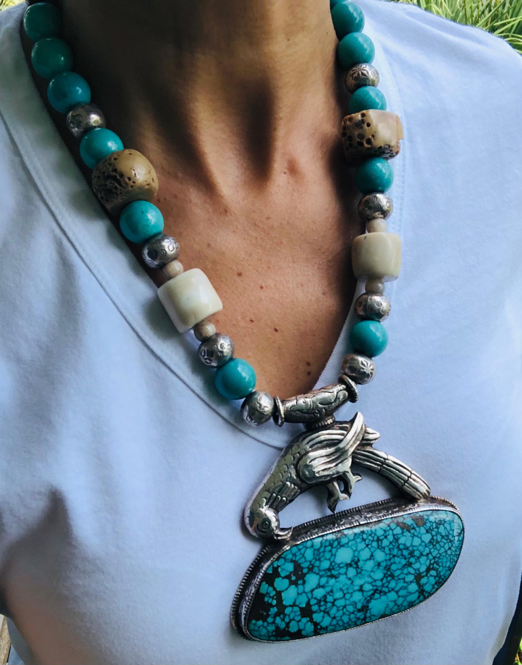 A.Jeschel Turquoise and Ethnic beads necklace with Tibetan Silver Bird Pendant   In New Condition For Sale In Miami, FL