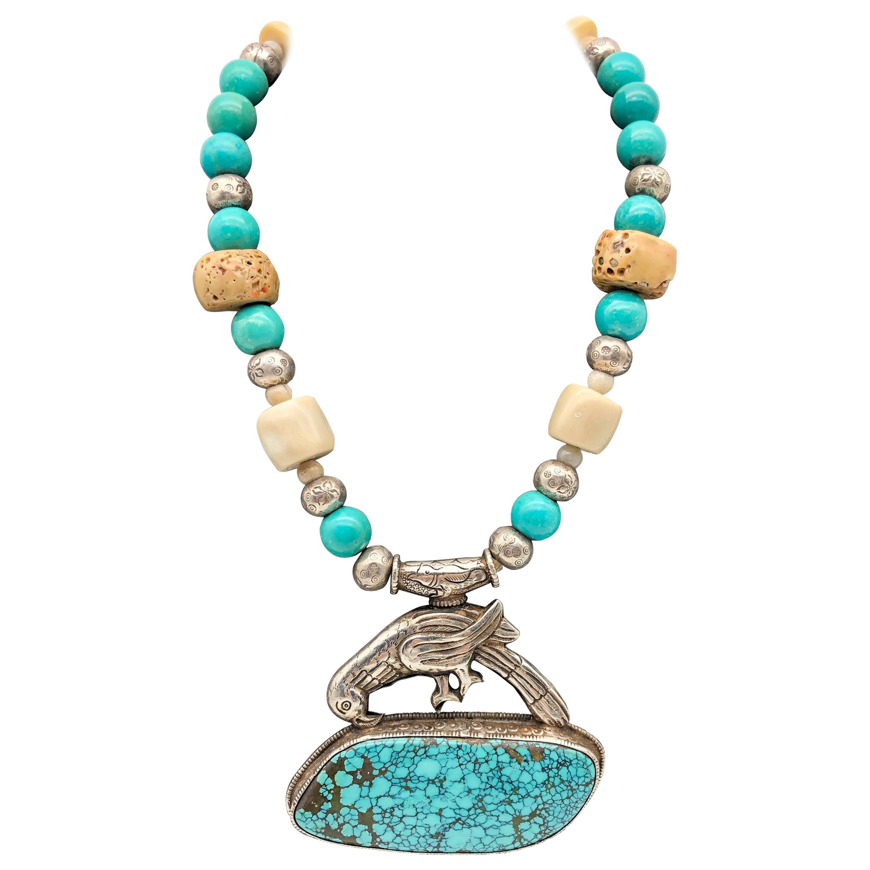 A.Jeschel Turquoise and Ethnic beads necklace with Tibetan Silver Bird Pendant   For Sale
