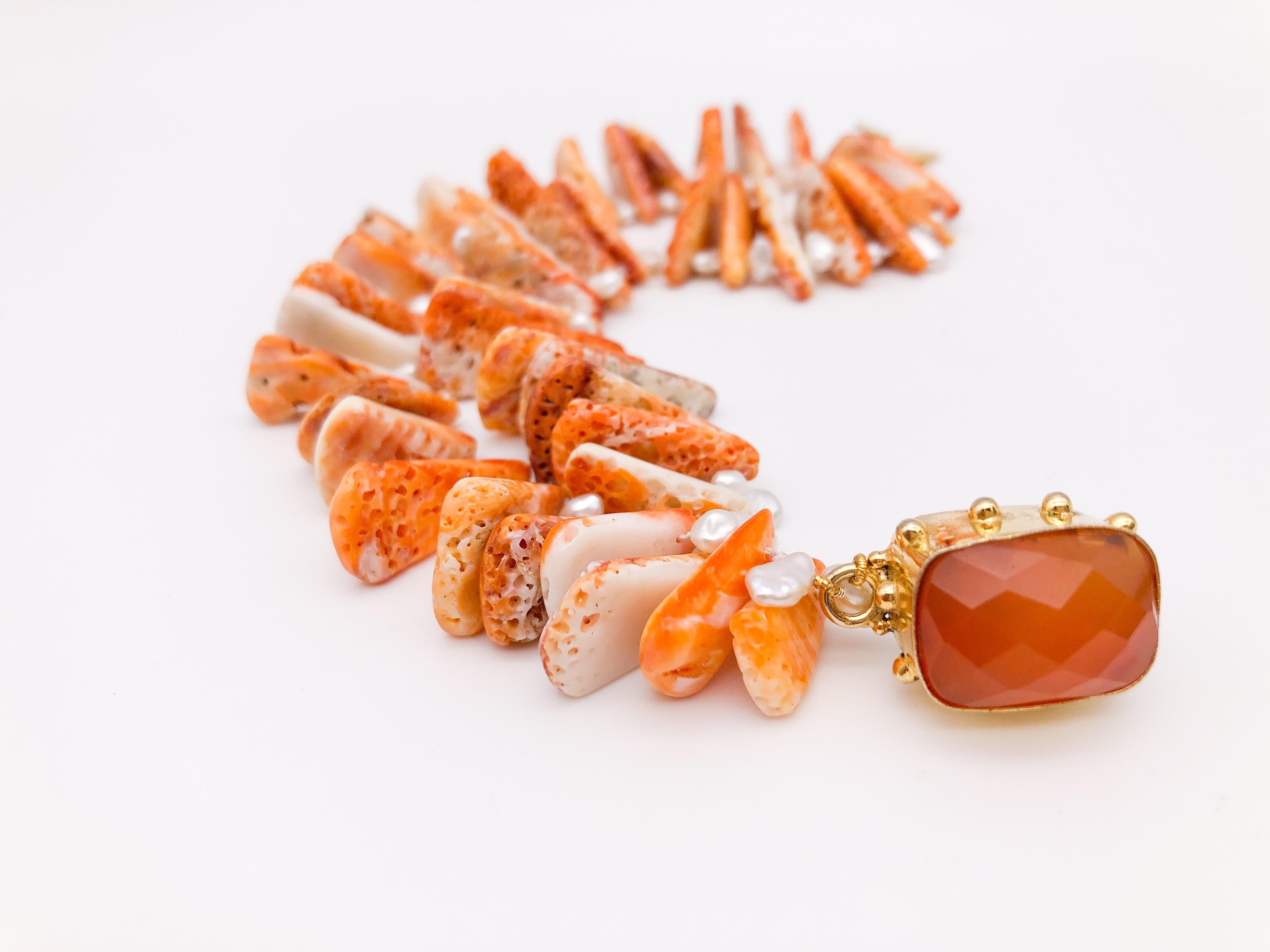 One-of-a-Kind

Natural Spiny Oyster Shell two-strand bracelet, gorgeous orange color-separated with freshwater pearls.
Matching with a faceted Carnelian gemstone set on Vermeil clasp.
Silk hand-knotted
Approx: 