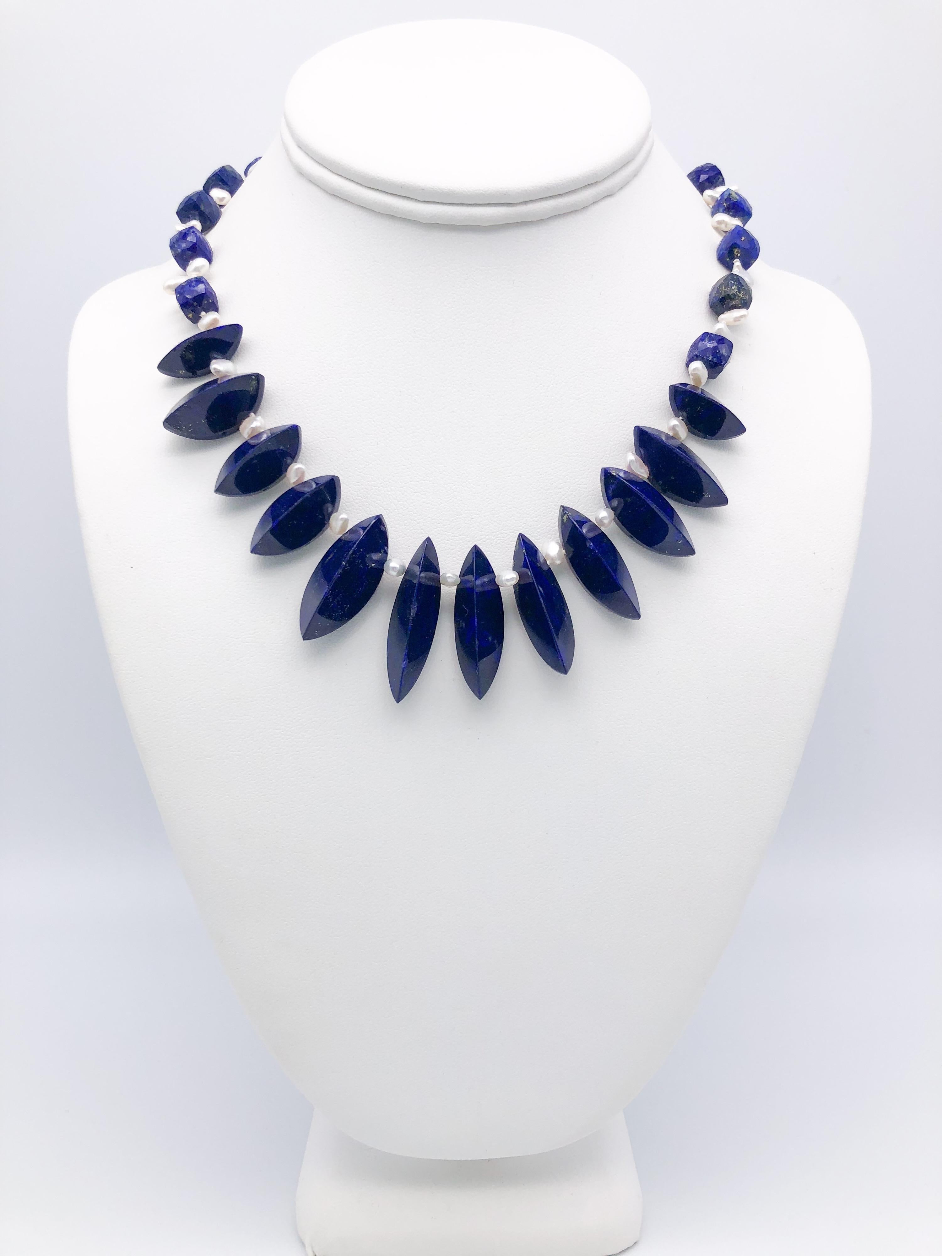 Contemporary A.Jeschel Unusually cut Lapis beads are strung in a flattering necklace. For Sale