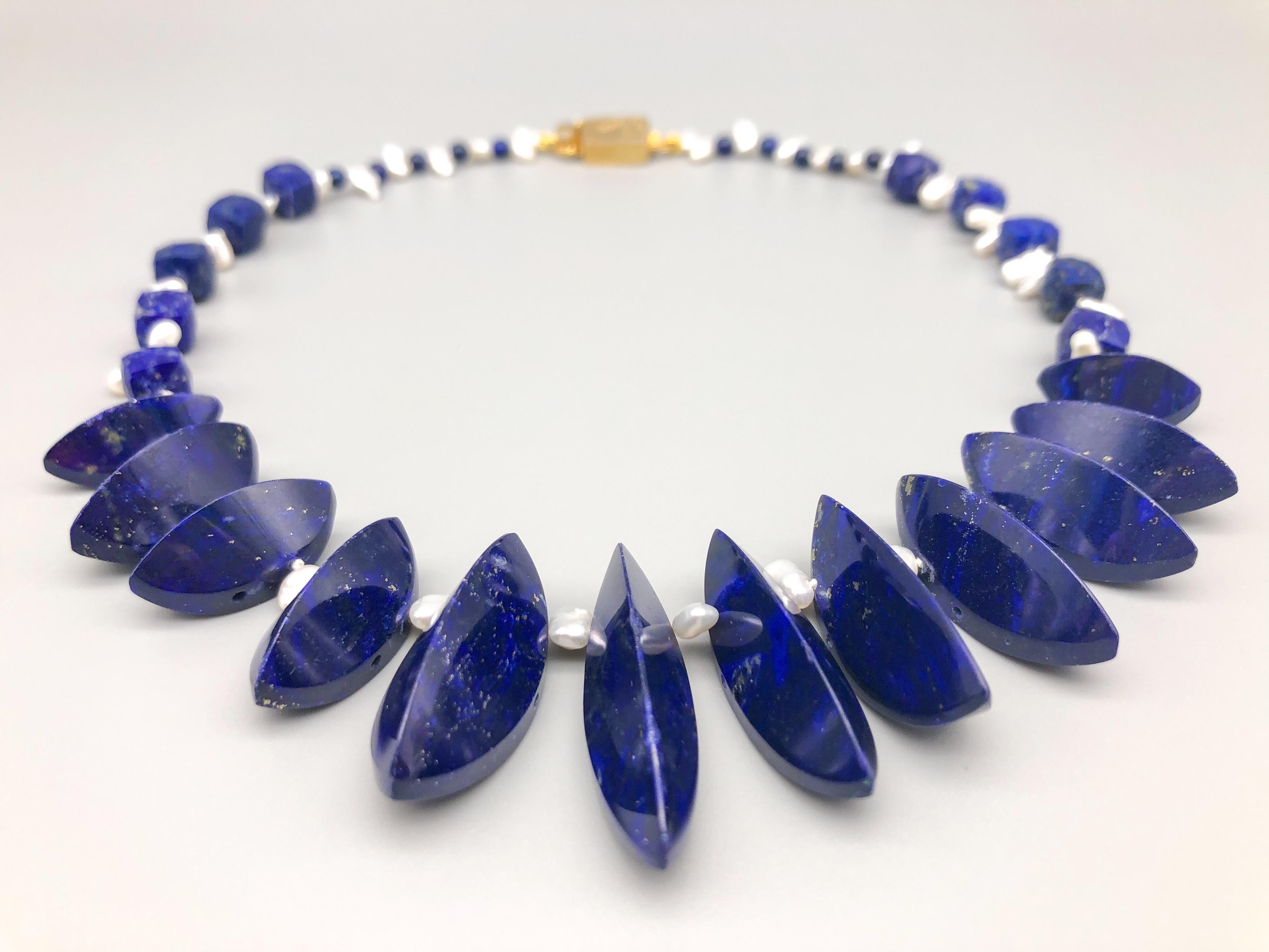 Mixed Cut A.Jeschel Unusually cut Lapis beads are strung in a flattering necklace. For Sale