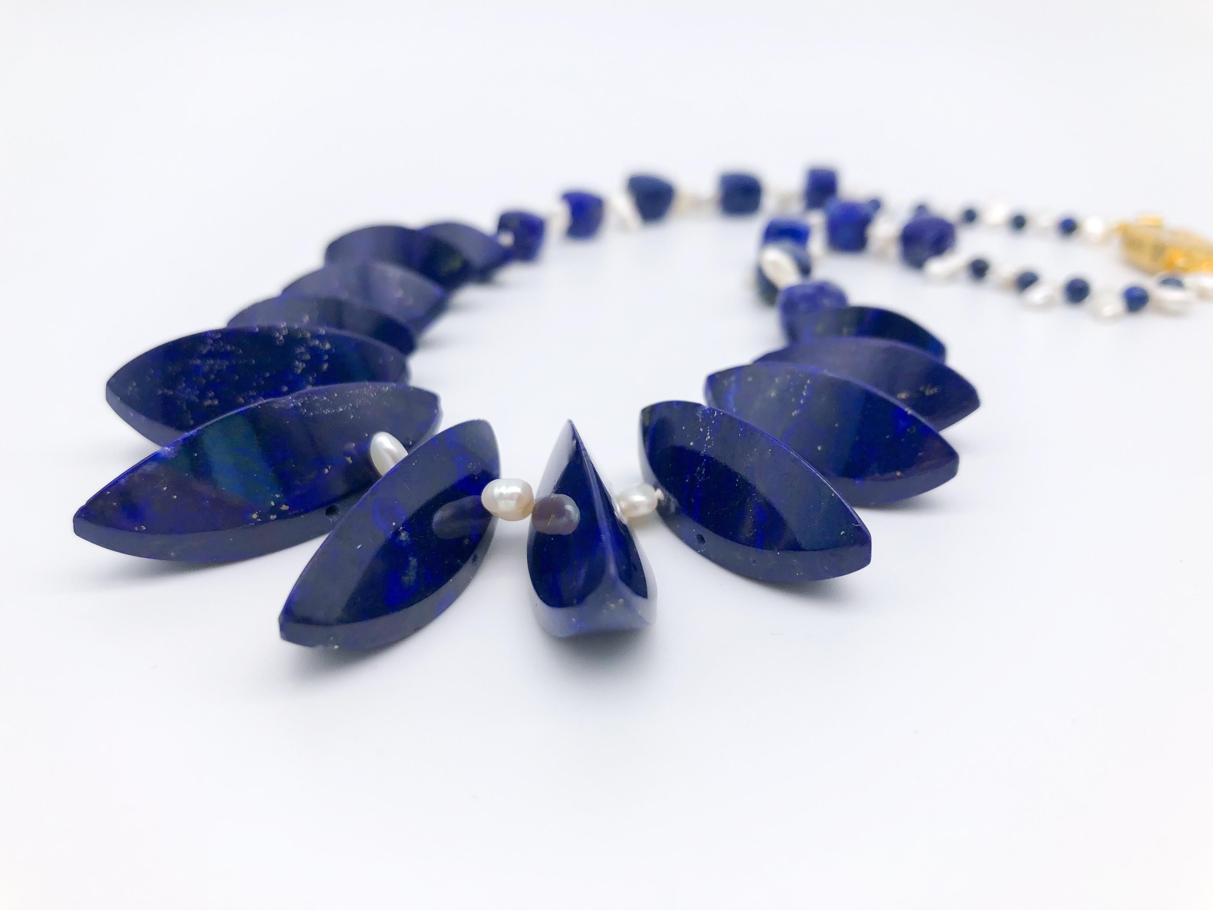 A.Jeschel Unusually cut Lapis beads are strung in a flattering necklace. In New Condition For Sale In Miami, FL