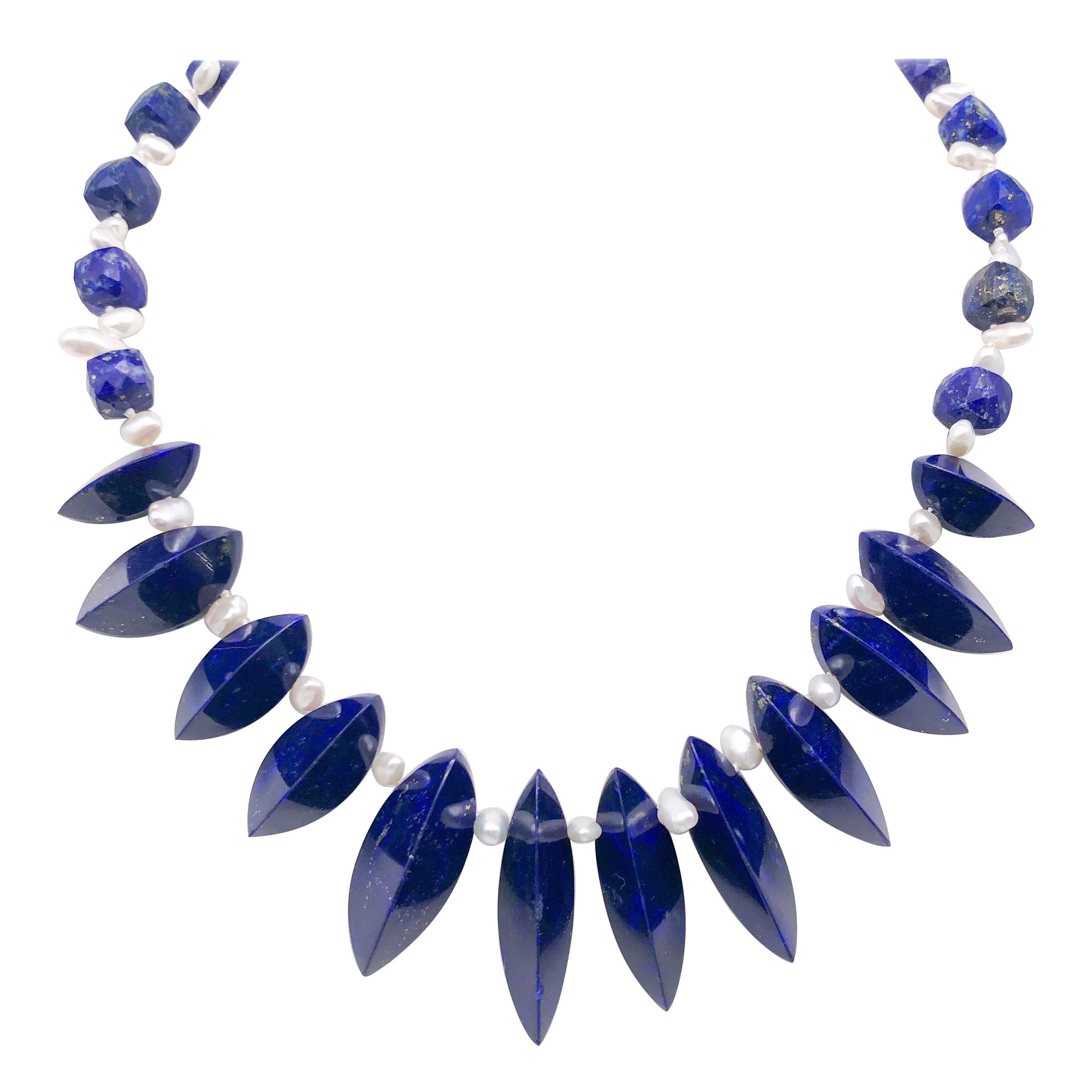 A.Jeschel Unusually cut Lapis beads are strung in a flattering necklace.