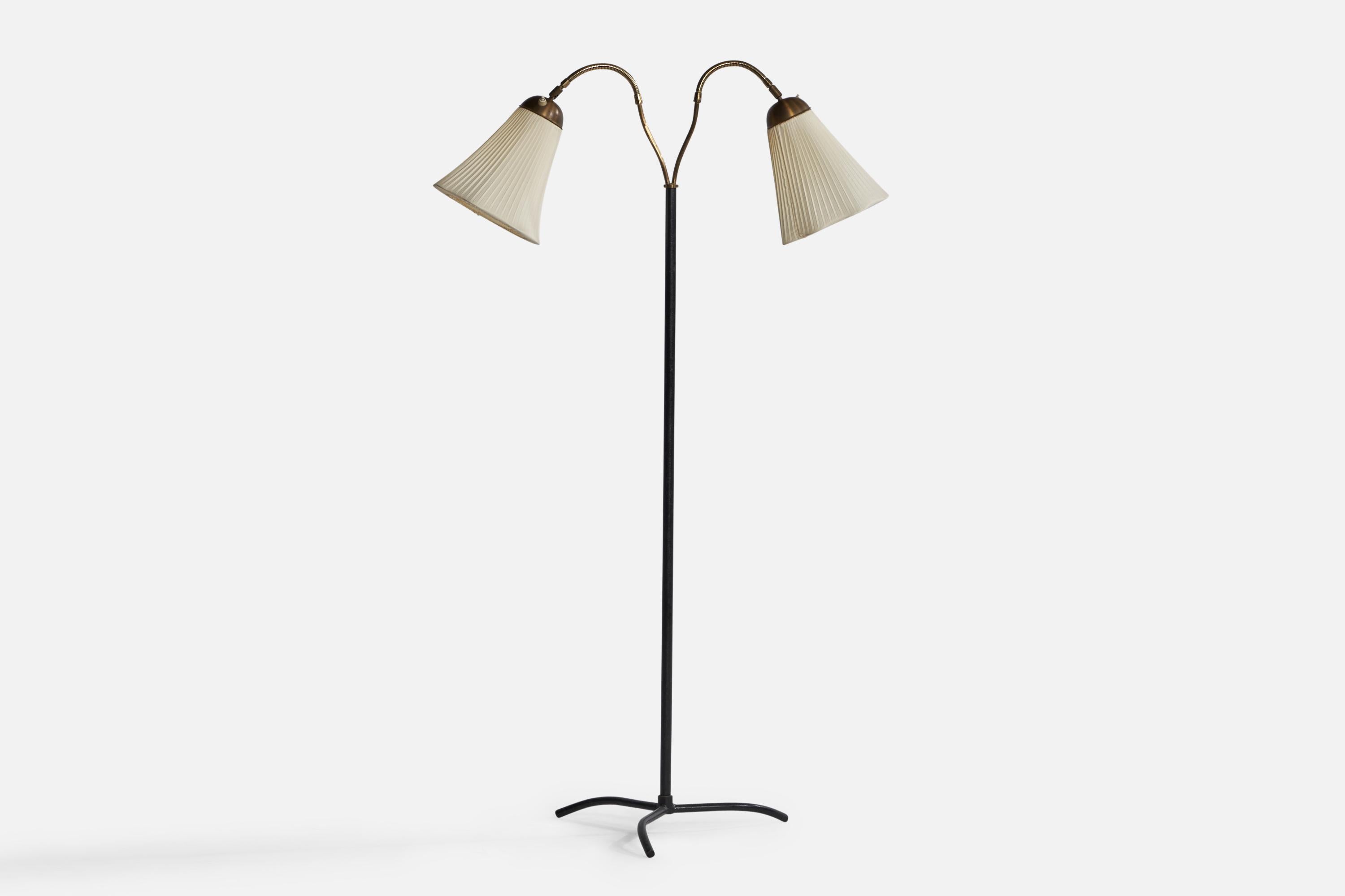 A brass, black-lacquered metal and fabric floor lamp designed and produced by AJH Belysning, Sweden, 1940s.

Overall Dimensions (inches): 57” H x 36” W x 24” D. Stated dimensions include shades.
Dimensions vary based on positions of lights.
Bulb