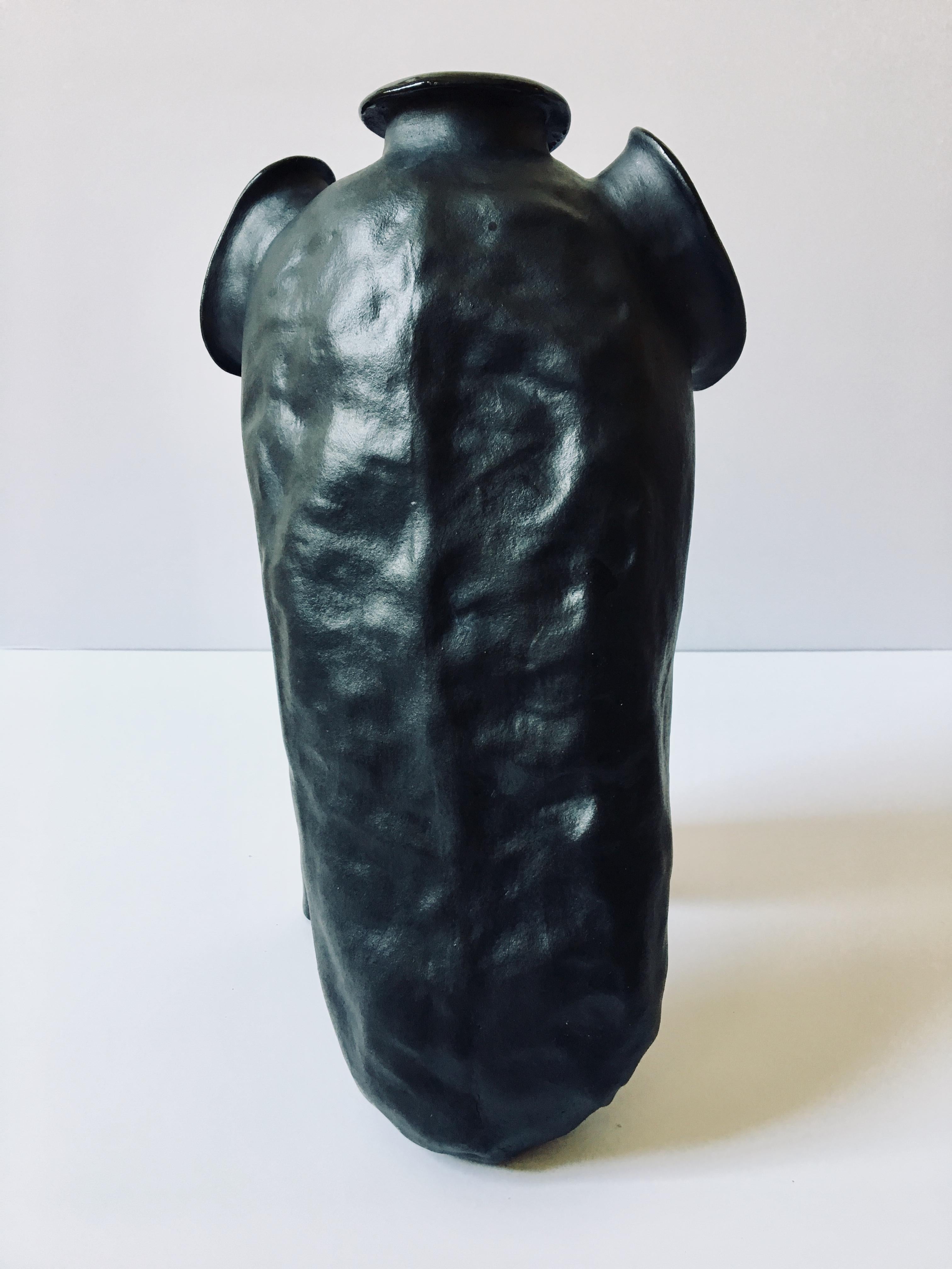 Sculpture of black ceramic vessel: 'Creature Medium No 6' 7